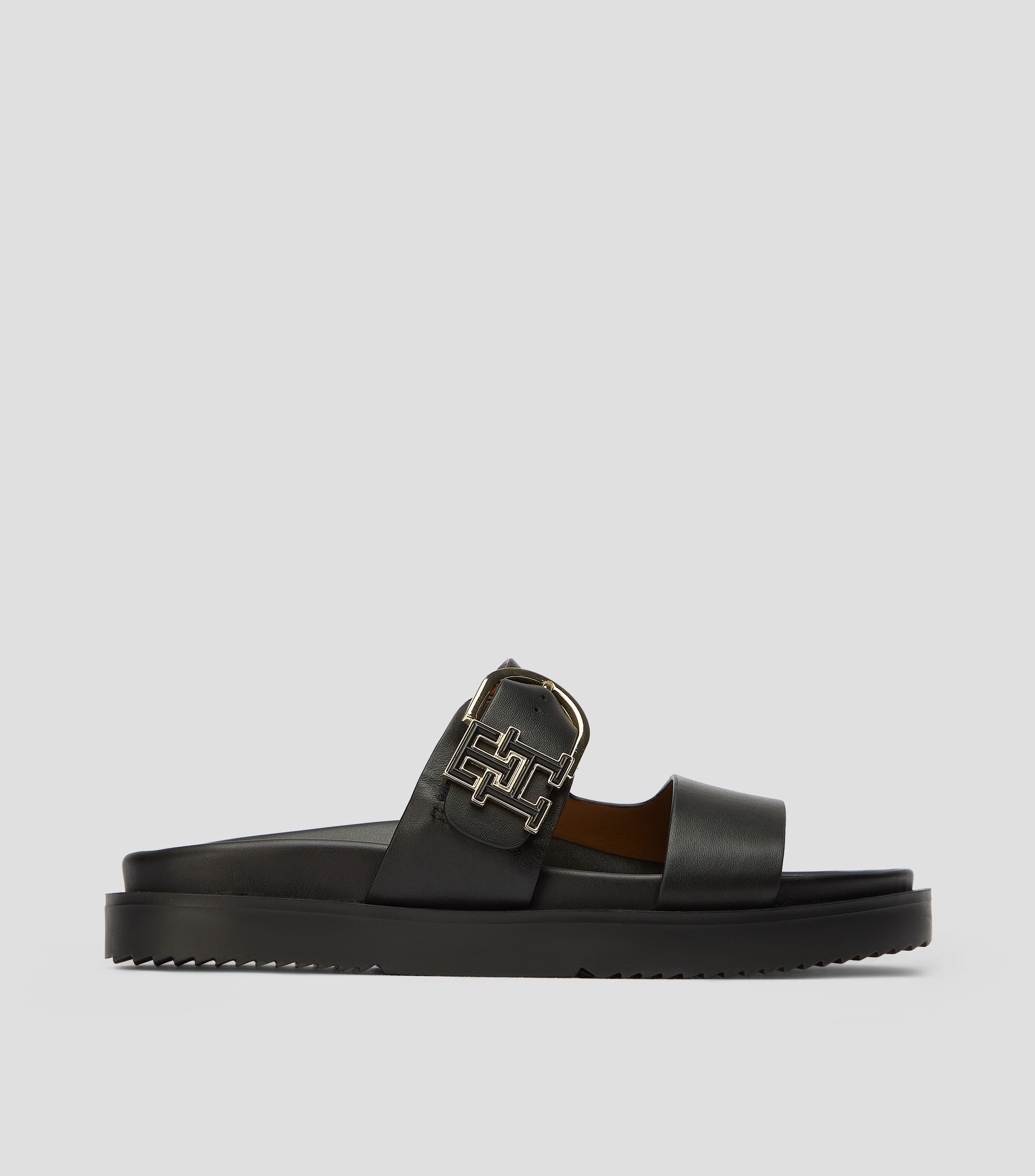 Sandalias planas en piel Mujer