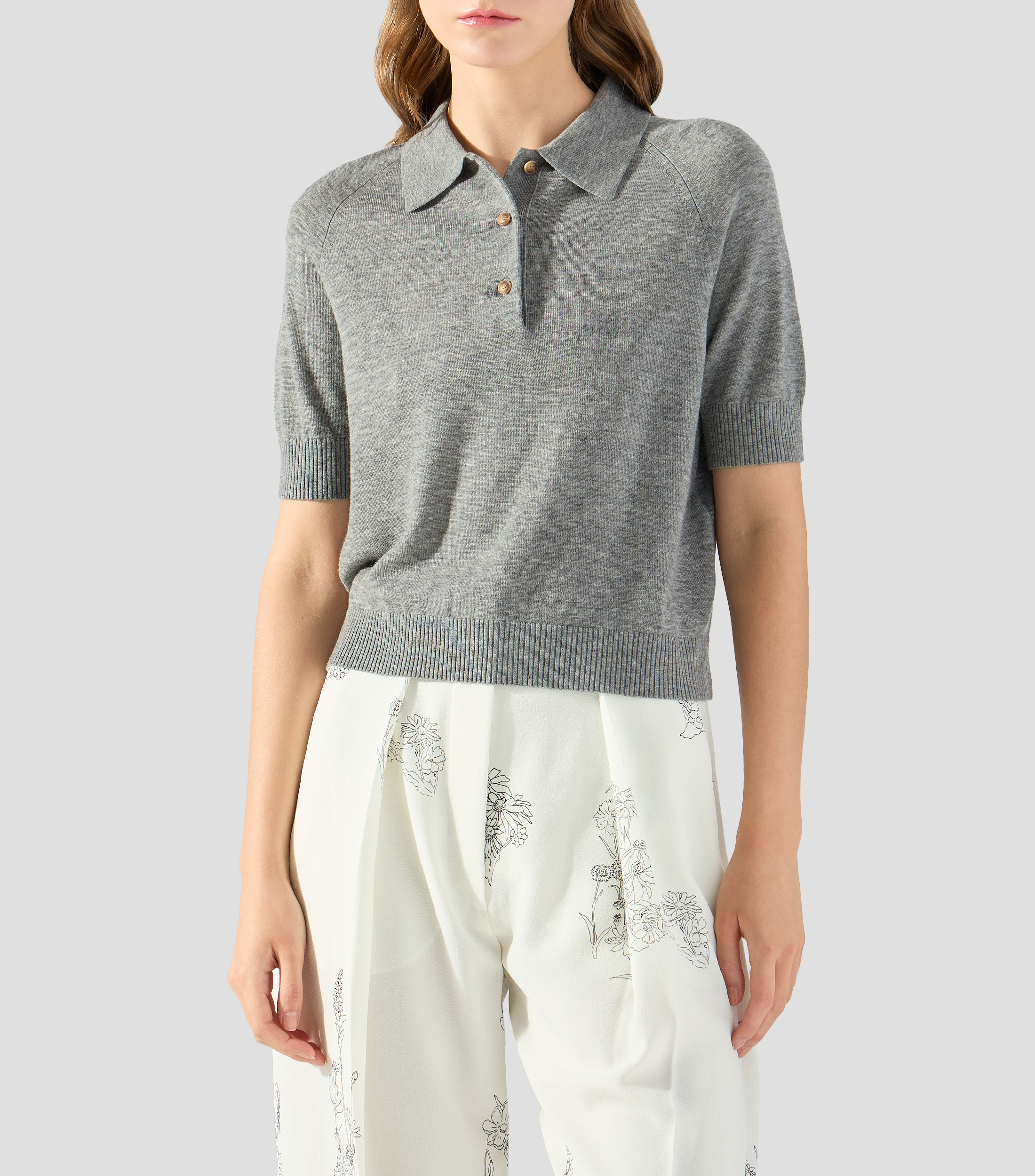 Playera tipo polo con manga corta jaspeada Mujer