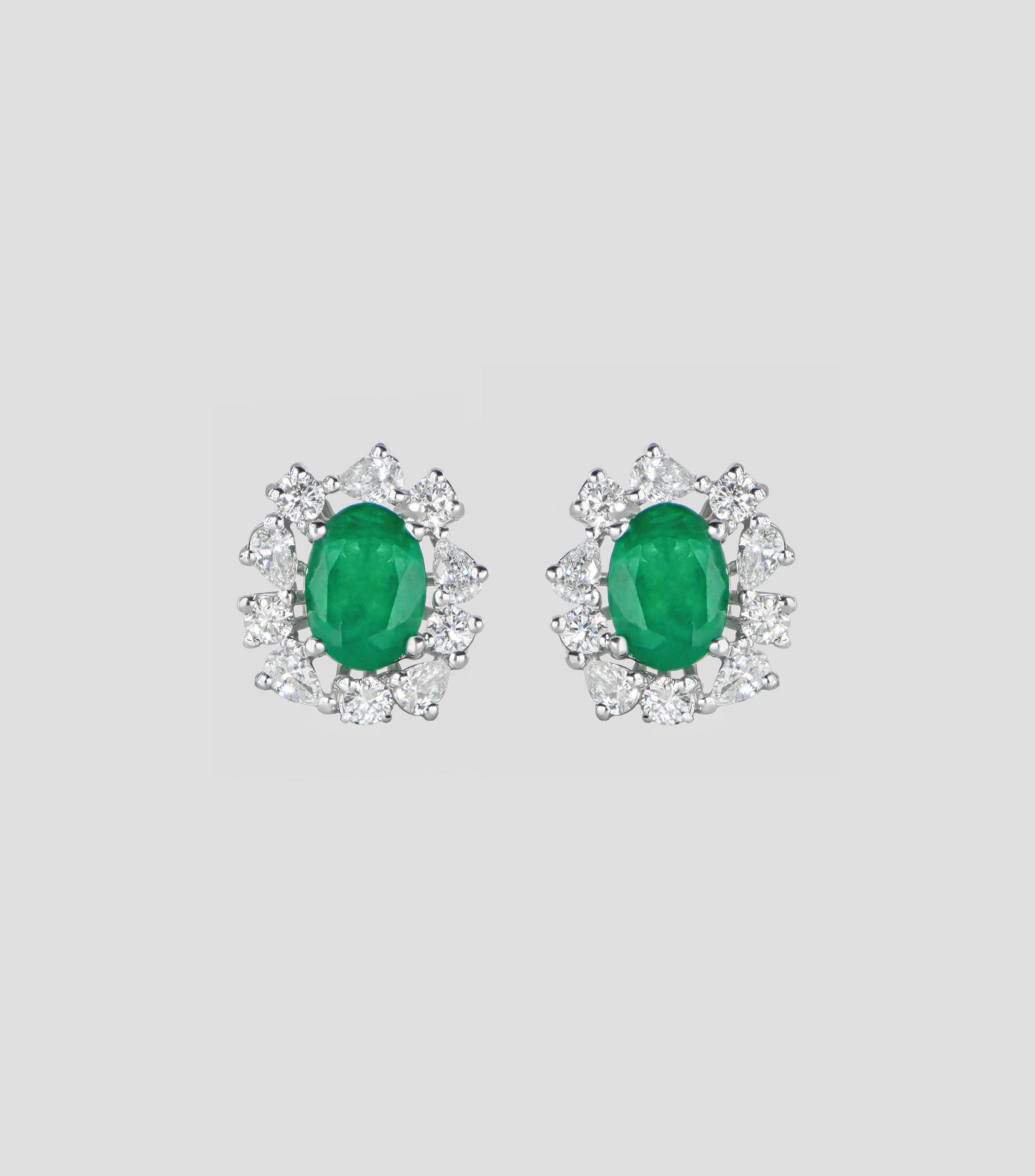 Broqueles en oro blanco de 14 kilates con esmeralda y diamantes Mujer
