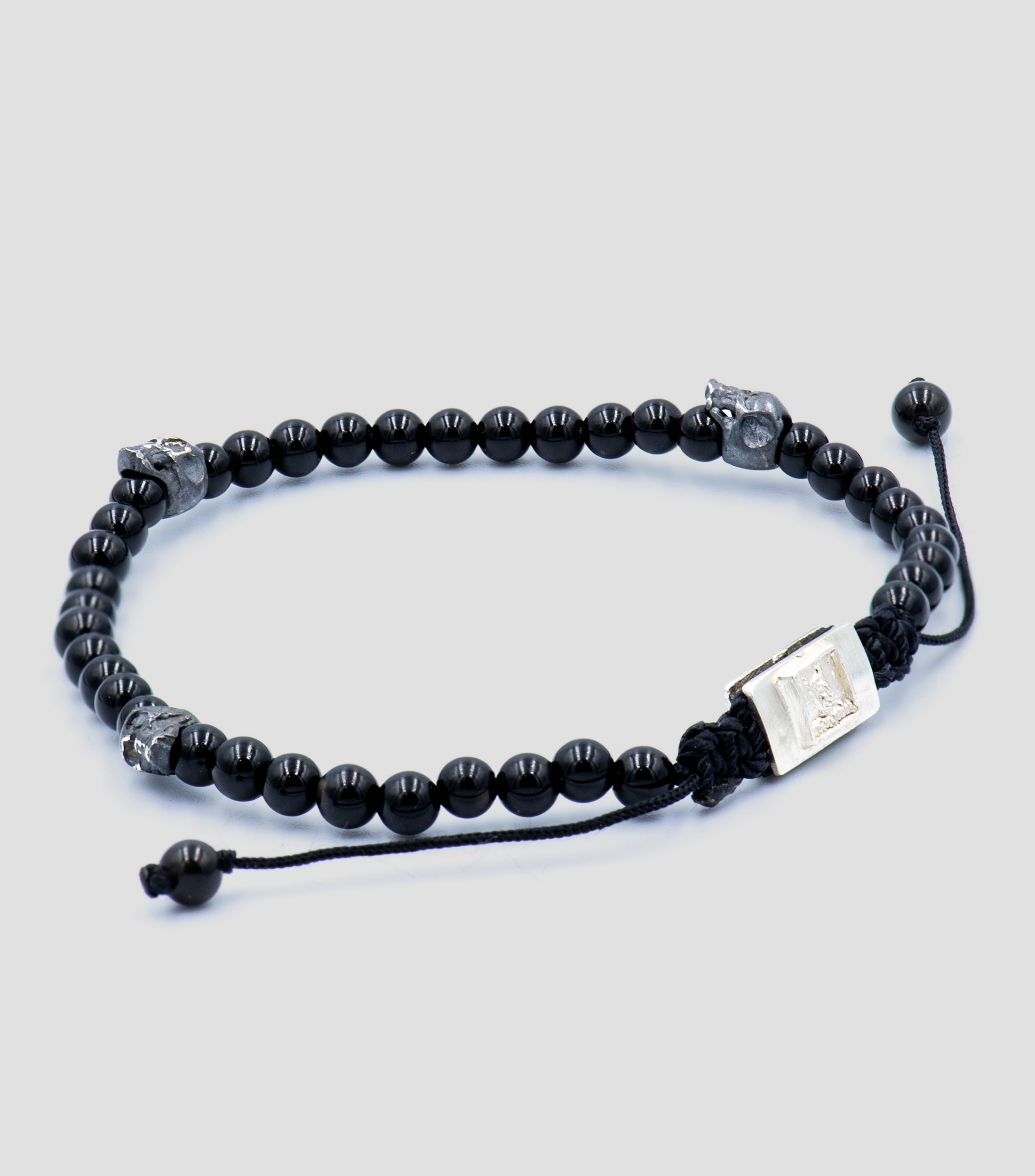 Pulsera ajustable onix calaveras Unisex