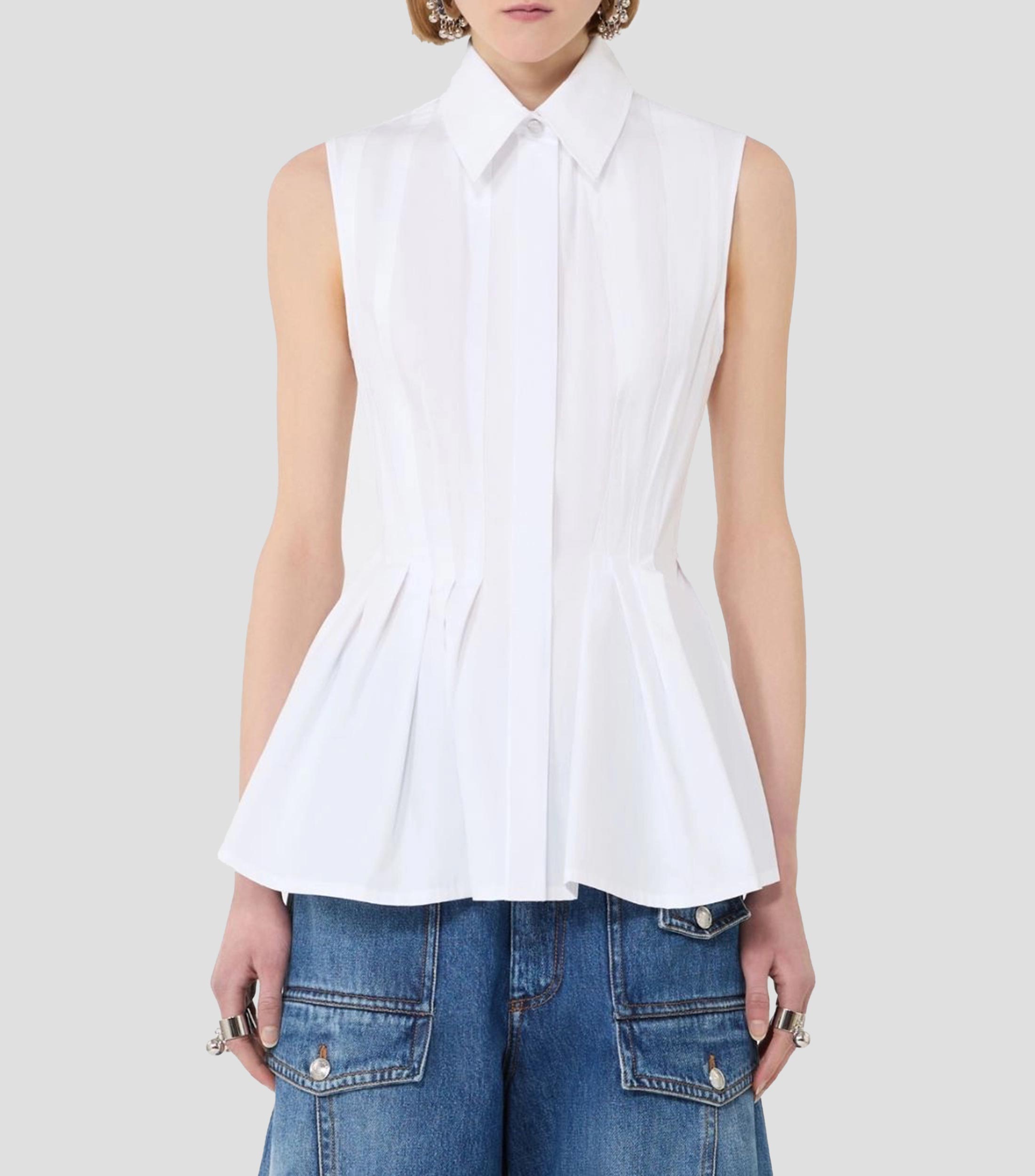 Camisa lisa sin mangas Mujer