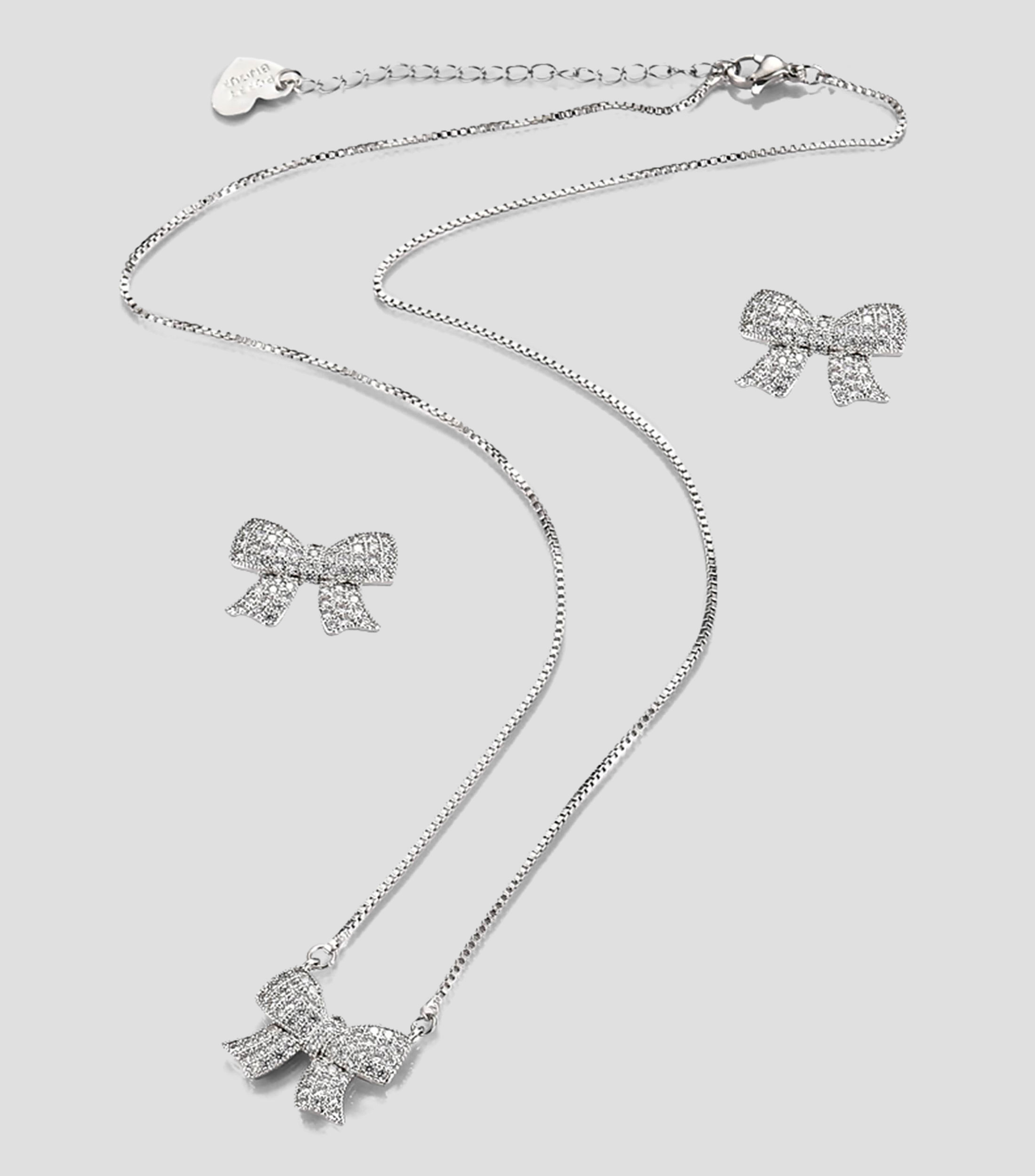 Set collar y aretes moño con zirconias Mujer