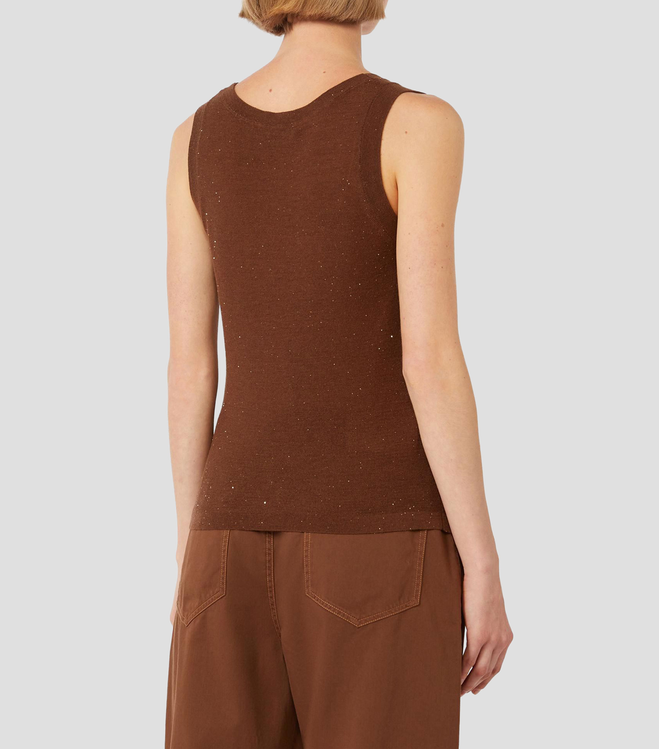 Blusa fantasía sin mangas Mujer