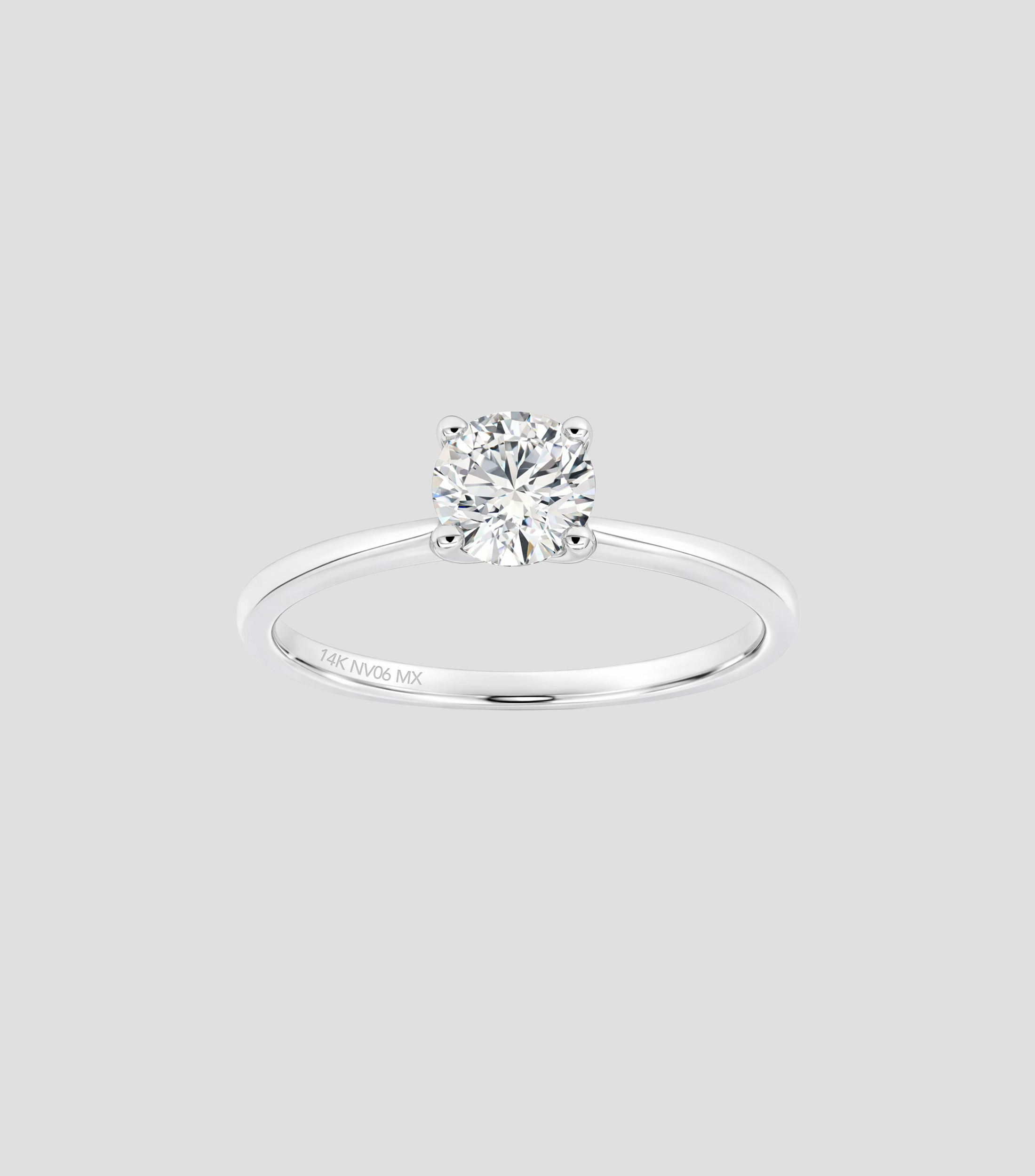 Anillo solitario en Oro blanco de 14 Kilates con diamante Mujer