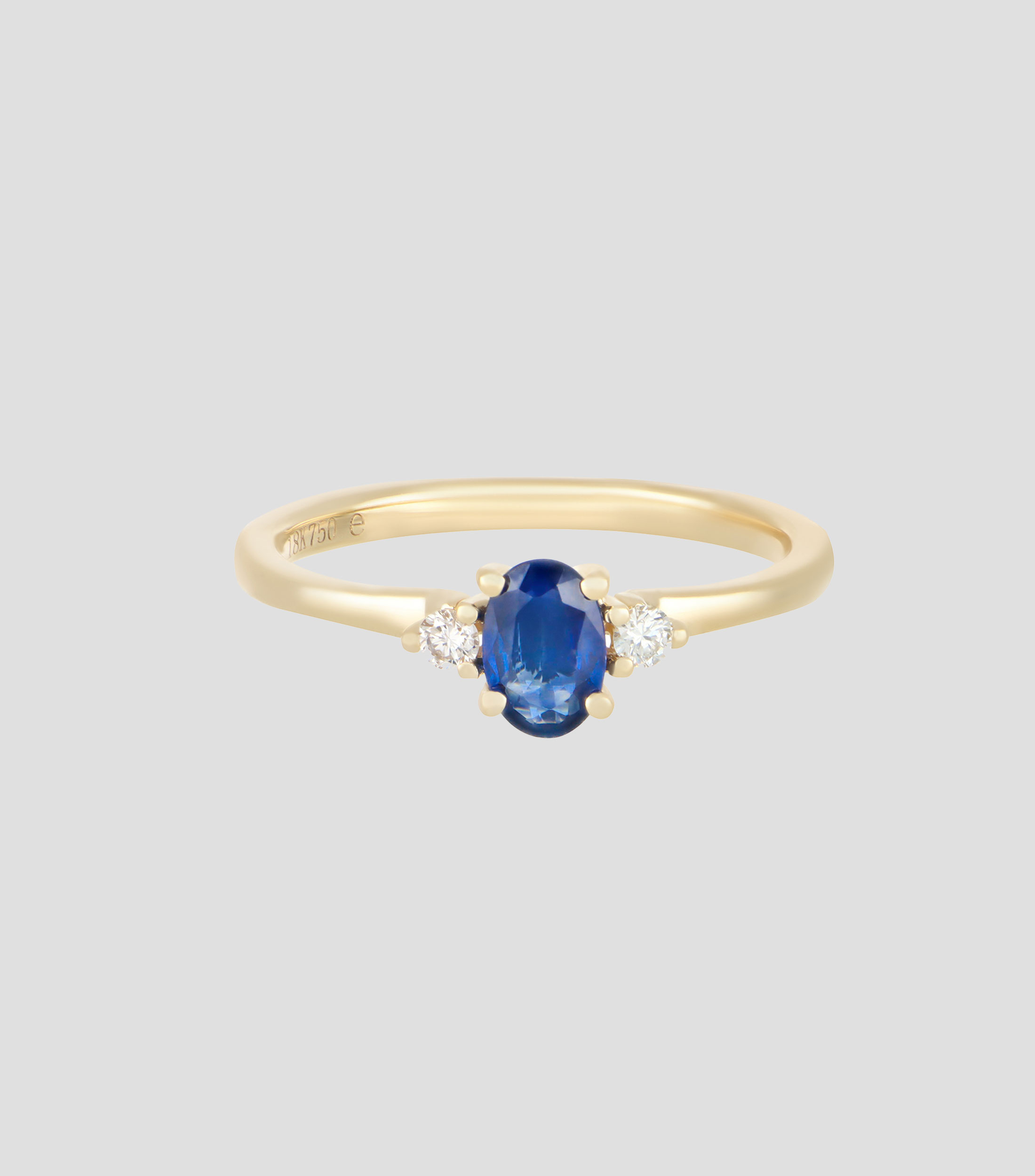 Anillo en oro amarillo de 18 kilates con zafiro y diamantes Mujer