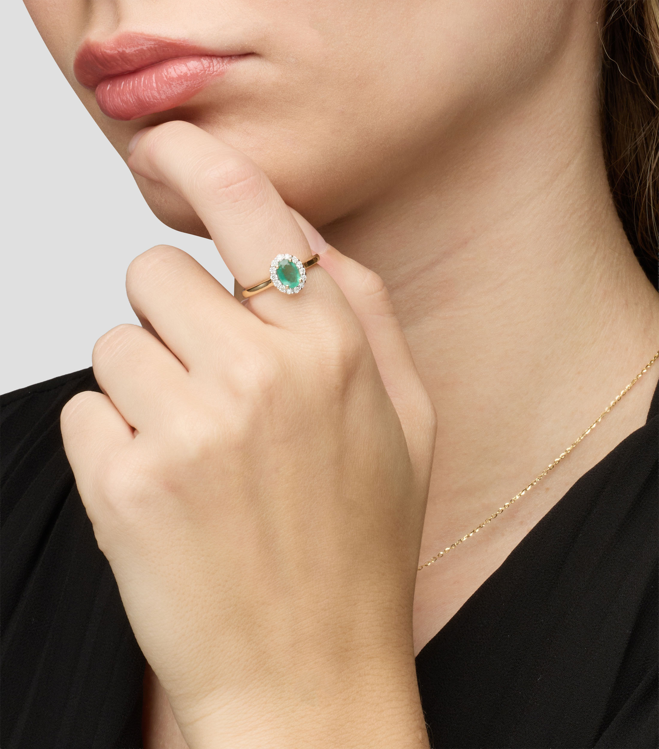 Anillo en Oro amarillo de 14 Kilates con esmeralda Mujer