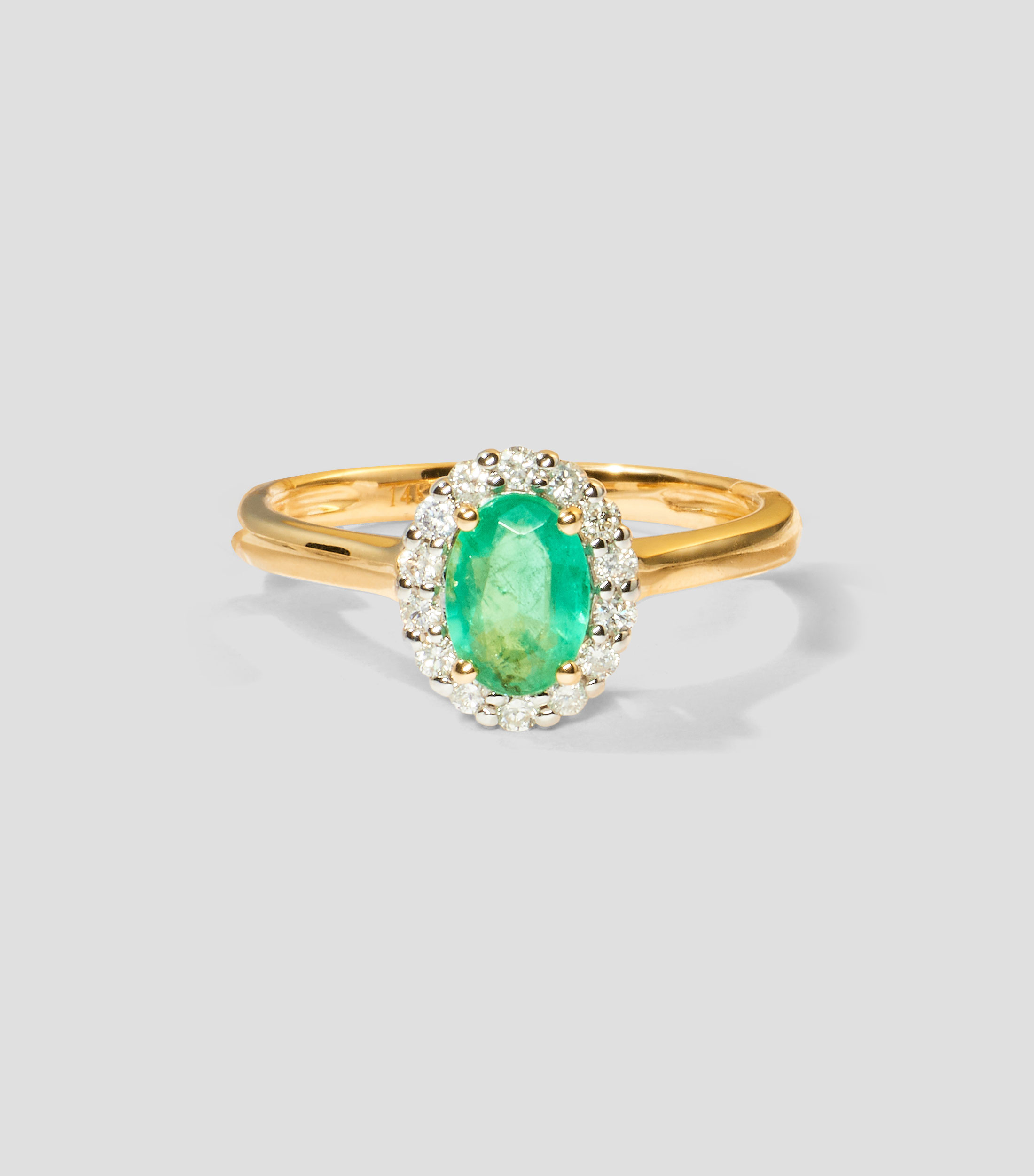 Anillo en Oro amarillo de 14 Kilates con esmeralda Mujer