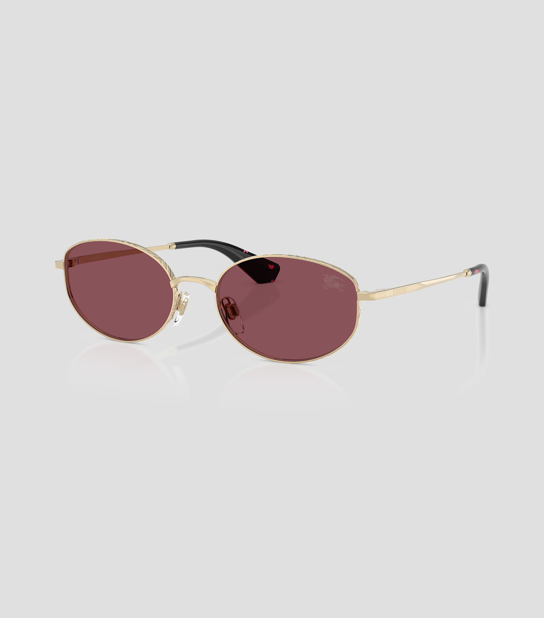Lentes de sol ovalados dorados Mujer