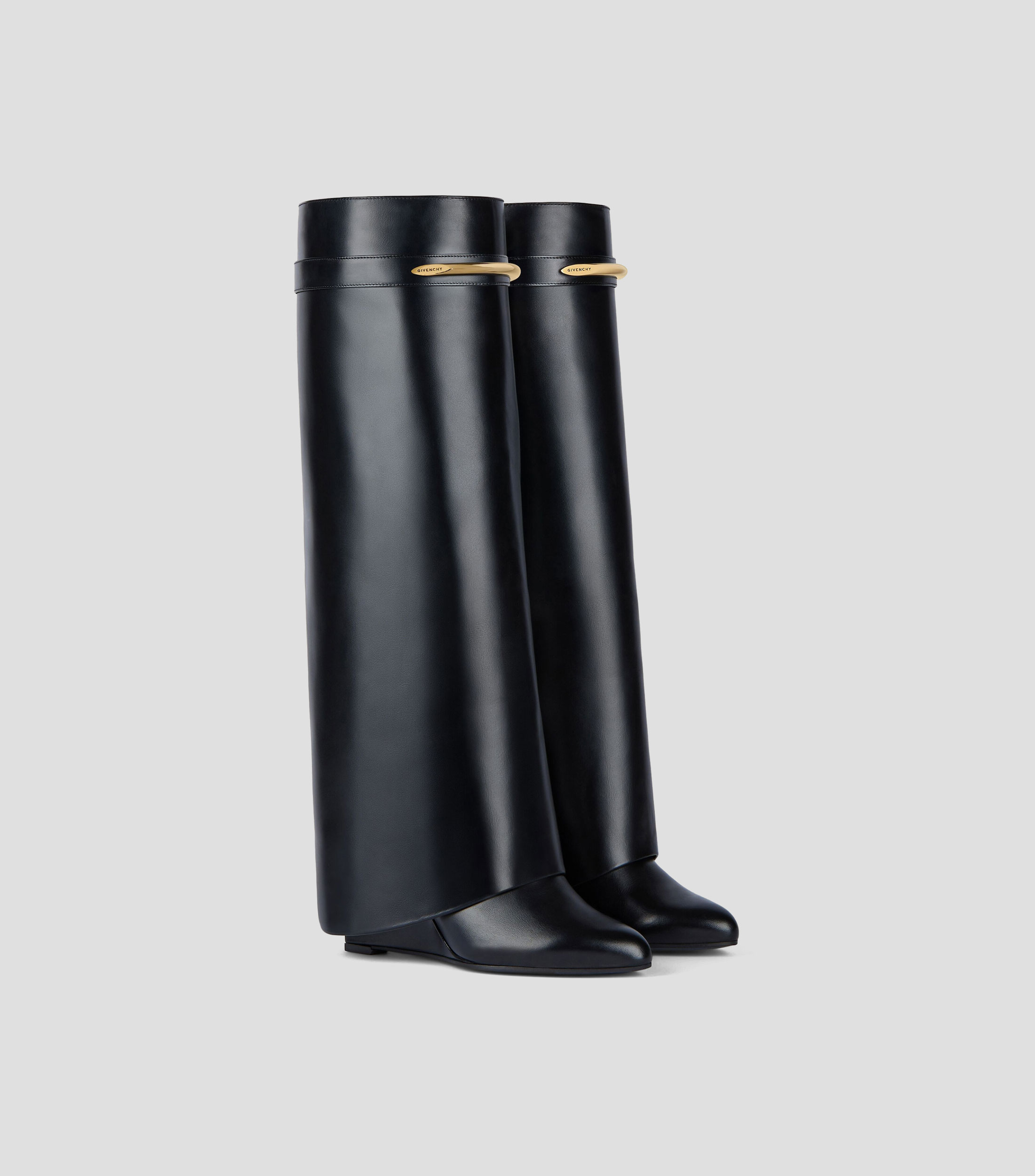 Botas largas en piel con tacón medio de cuña Mujer