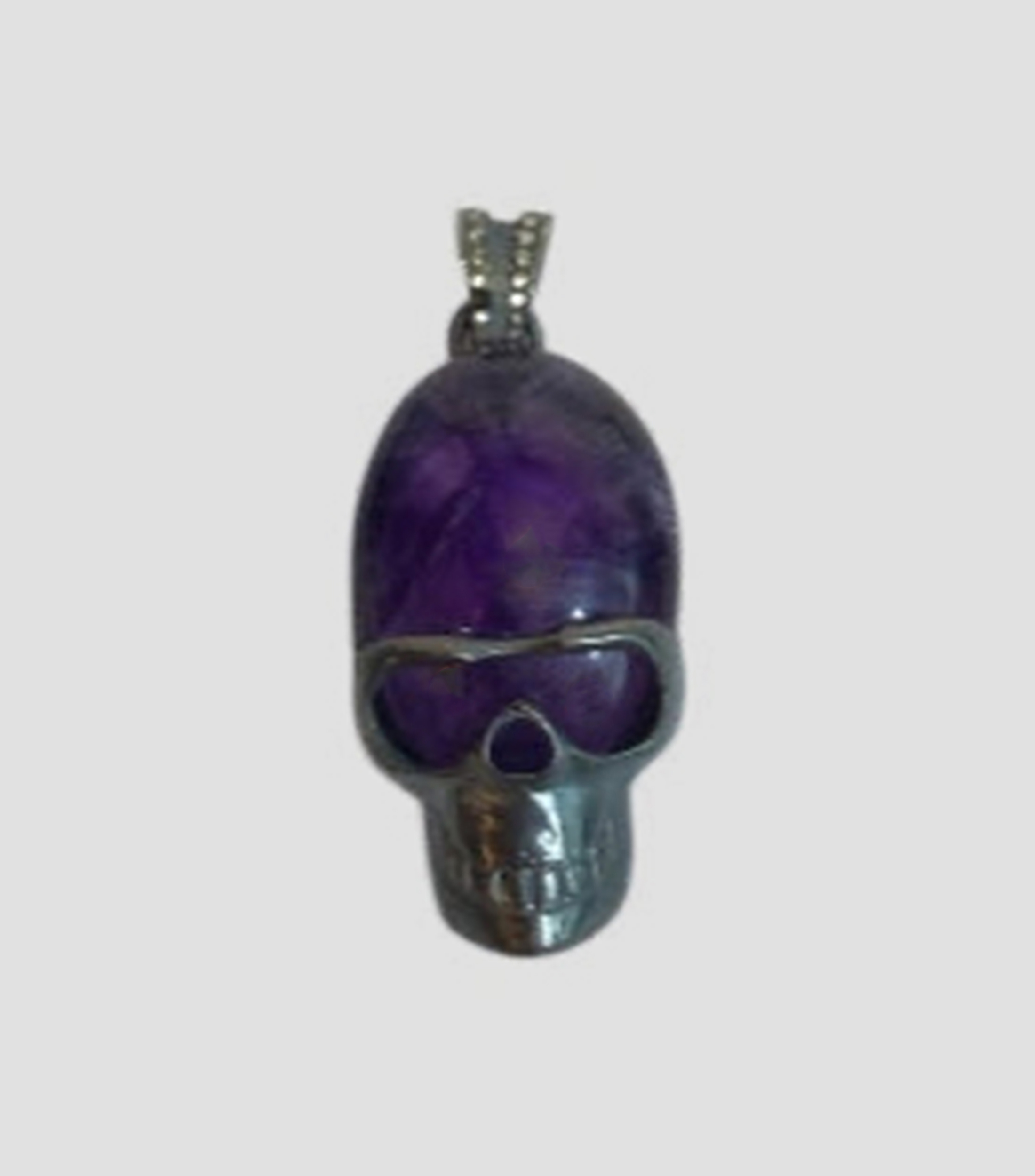 Dije Stone Skull en plata .925 con amatista Hombre