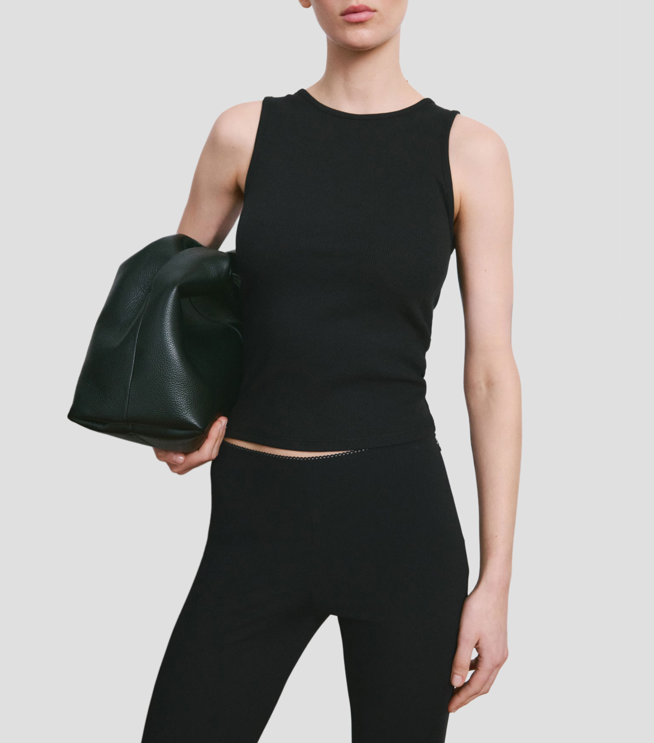 Blusa lisa sin mangas Mujer