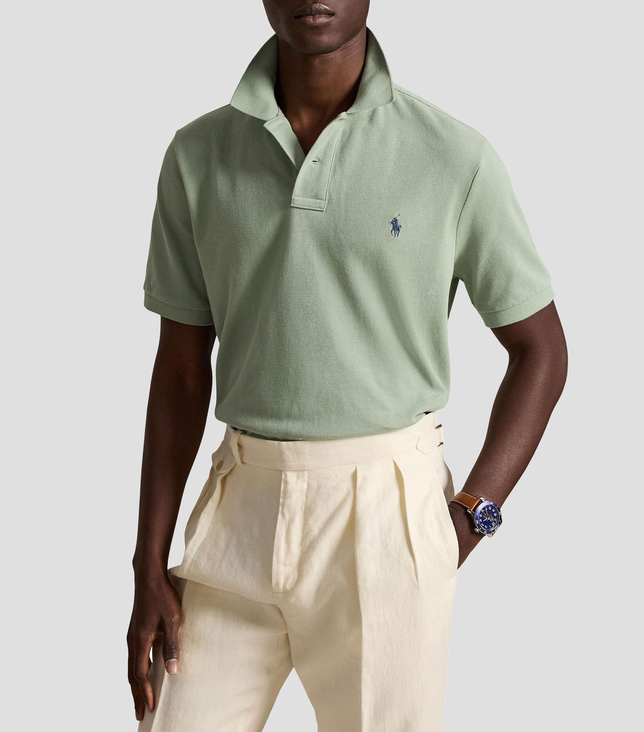 Playera tipo polo con manga corta lisa Hombre