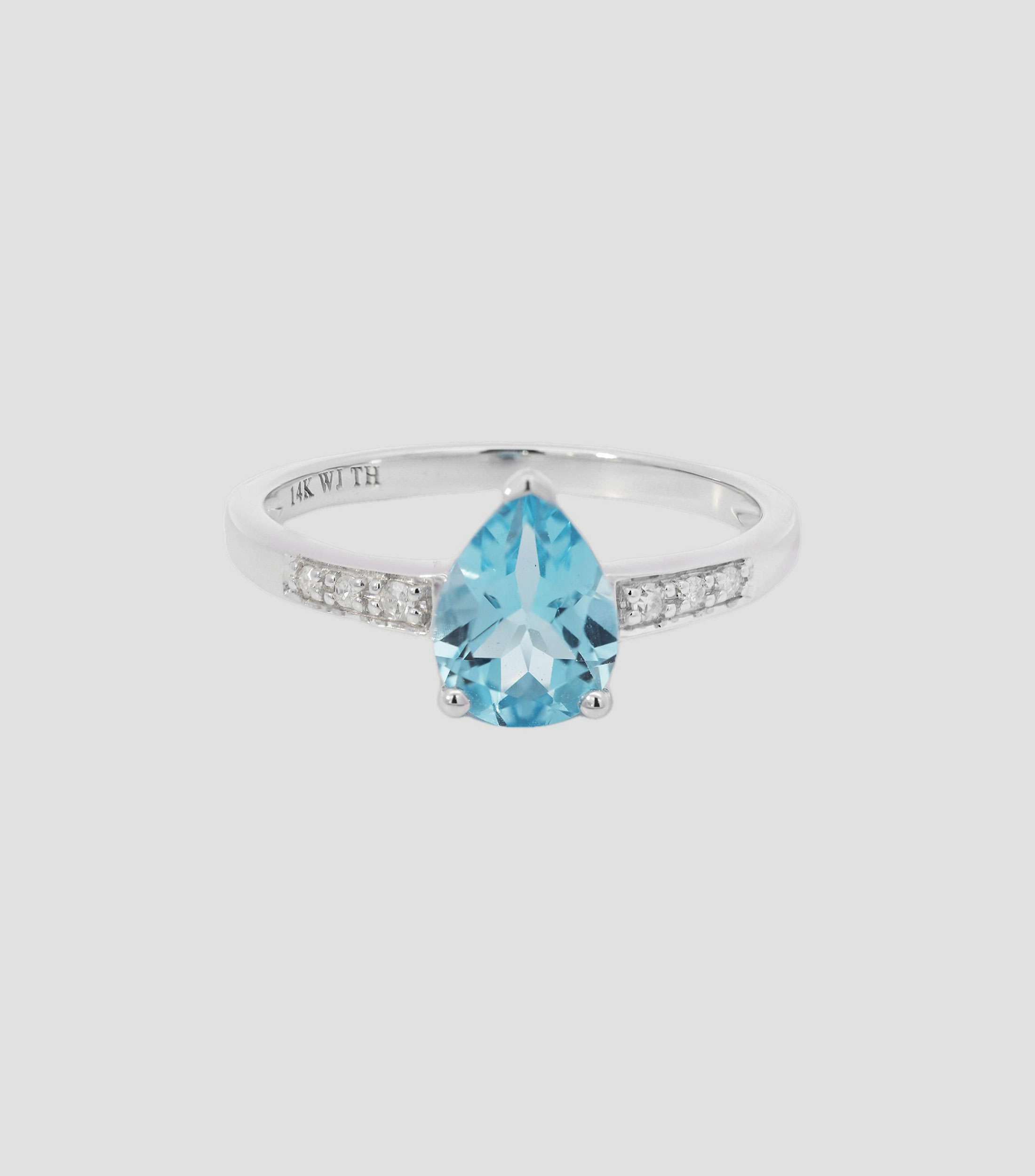 Anillo en Oro de 14 Kilates con Topacio Azul Mujer