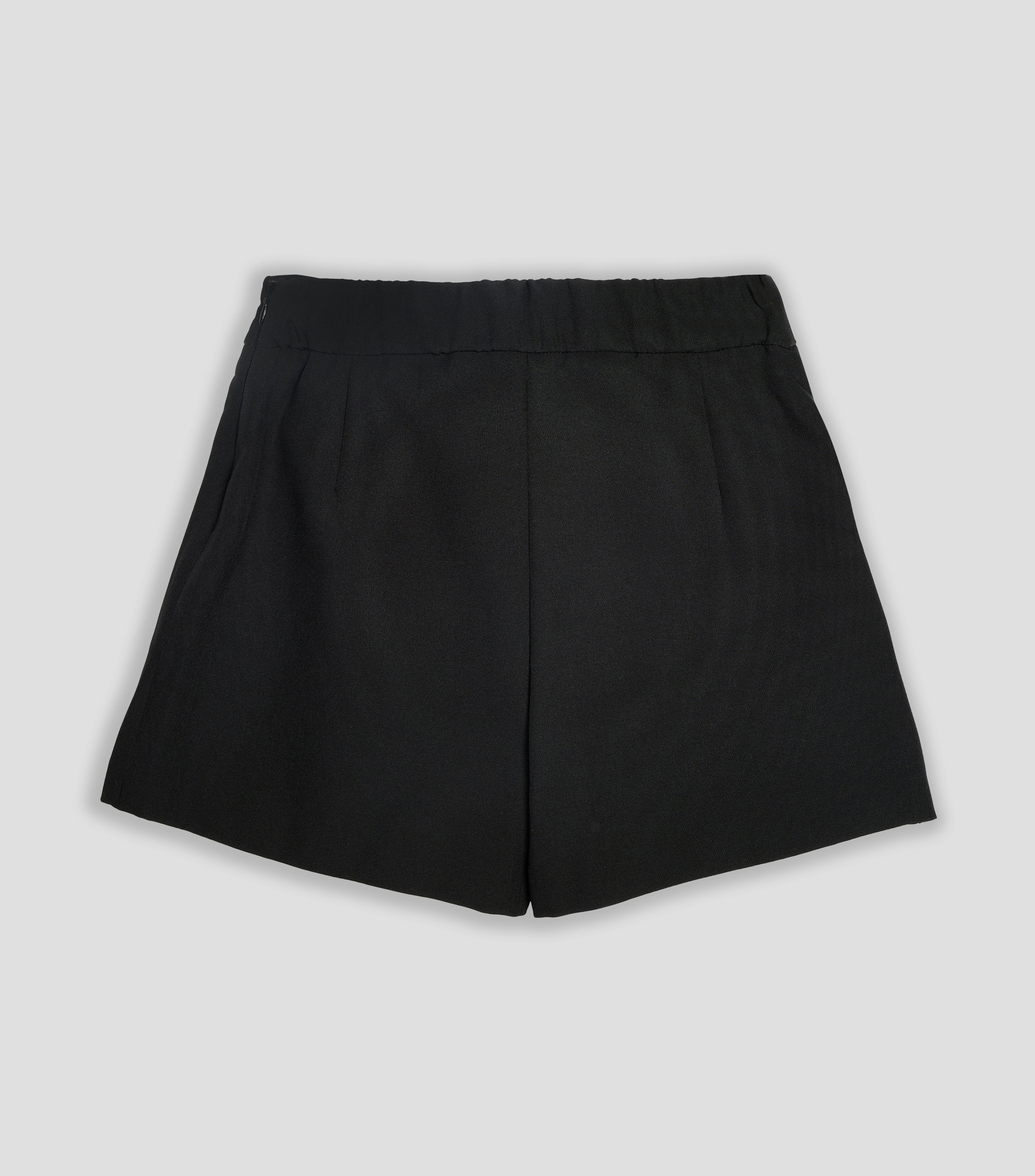 Falda short corta de corte recto lisa Niña