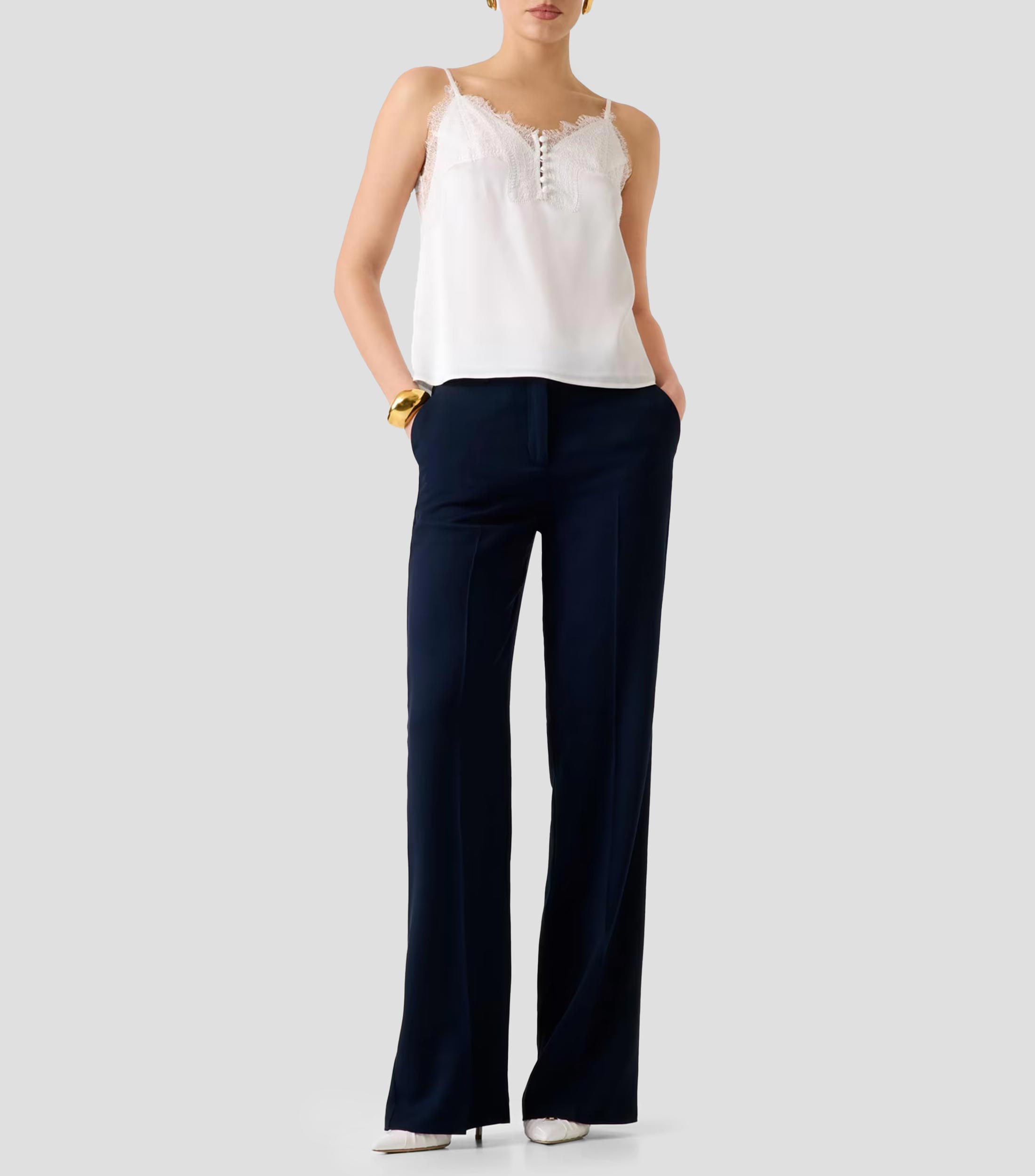Blusa lisa sin mangas Mujer