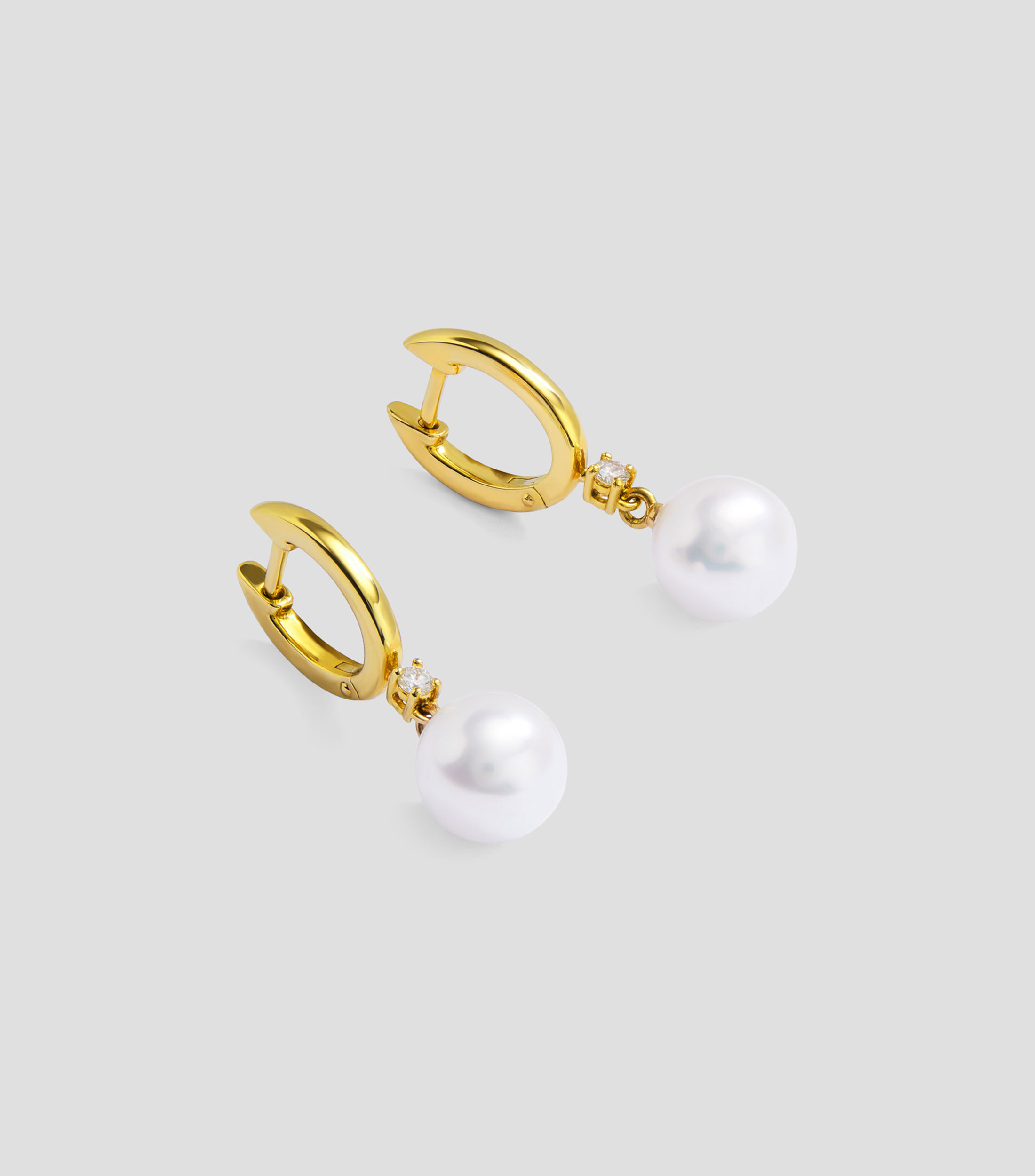 Aretes en Oro amarillo de 18 Kilates con perlas Mujer