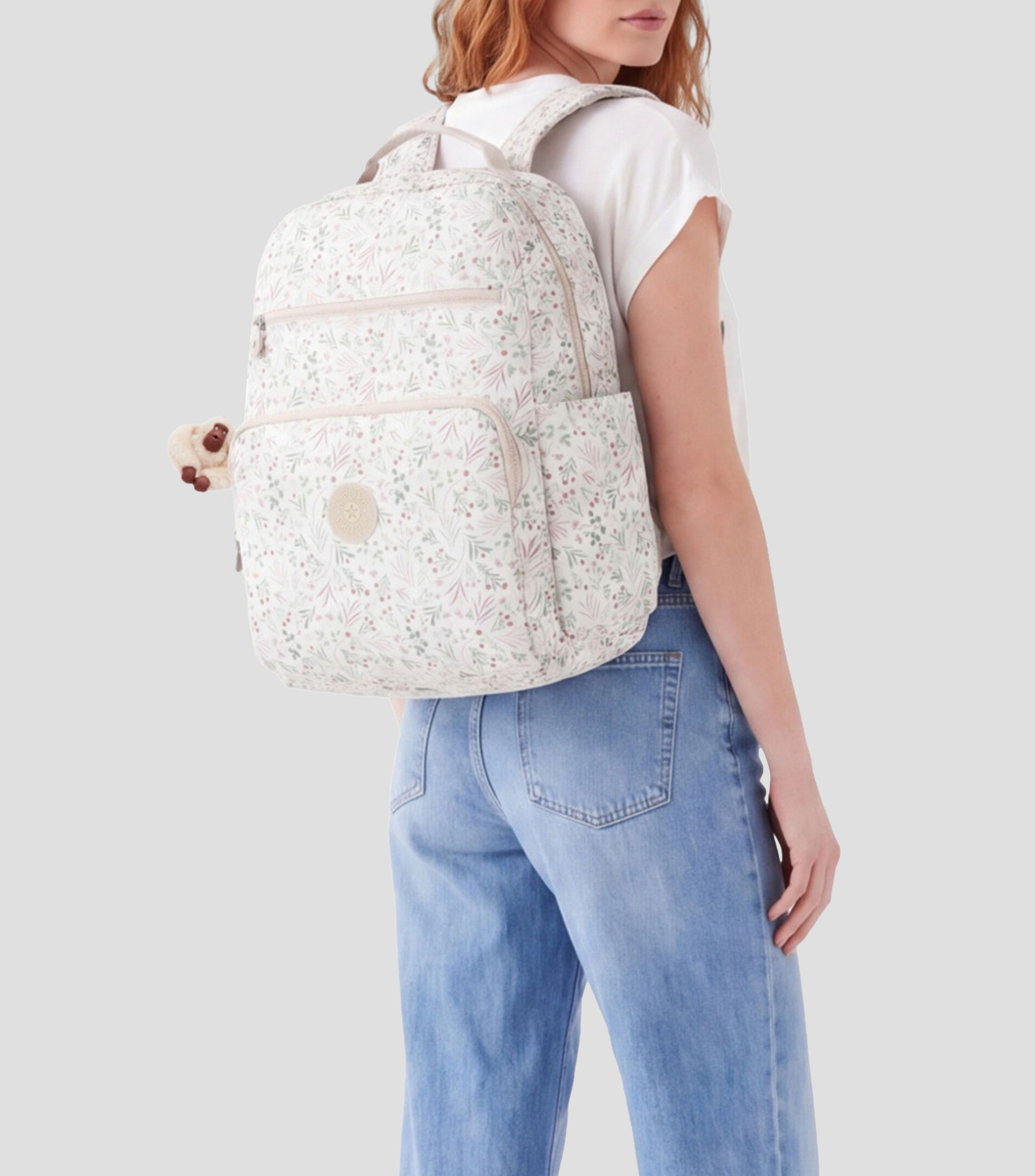 Pañalera tipo mochila con flores