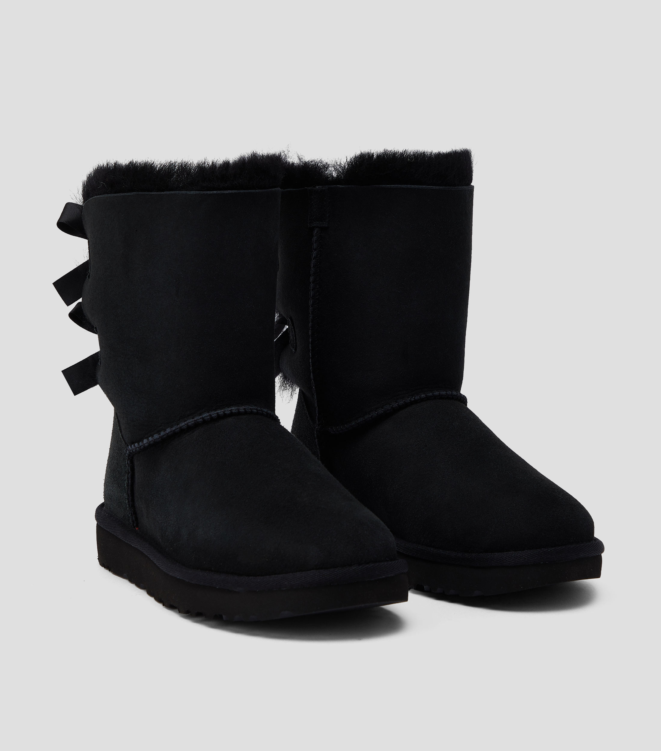 Botas medias Planas Bailey Bow en Piel Mujer