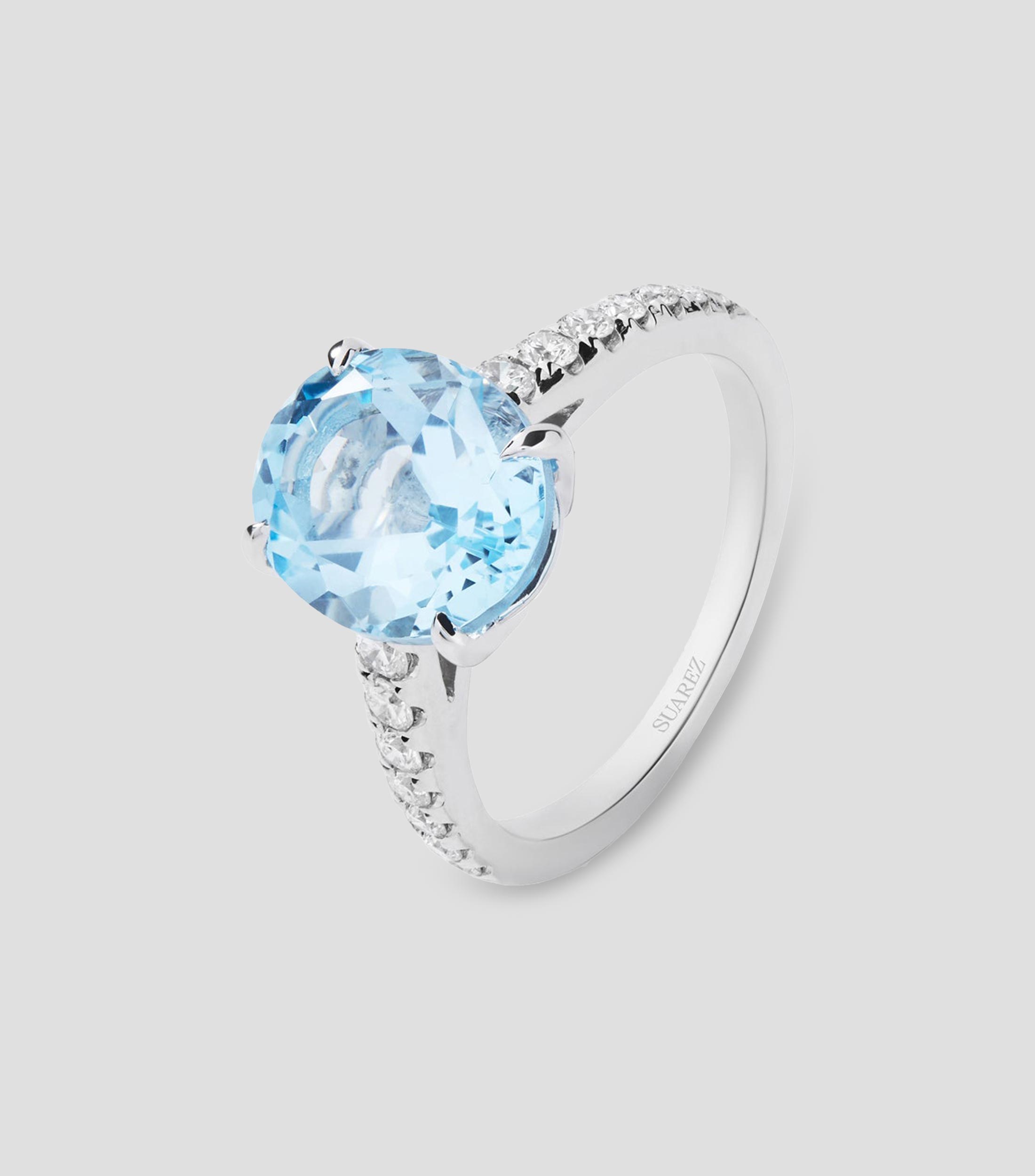 Anillo en Oro blanco de 18 Kilates con topacio y diamantes Mujer