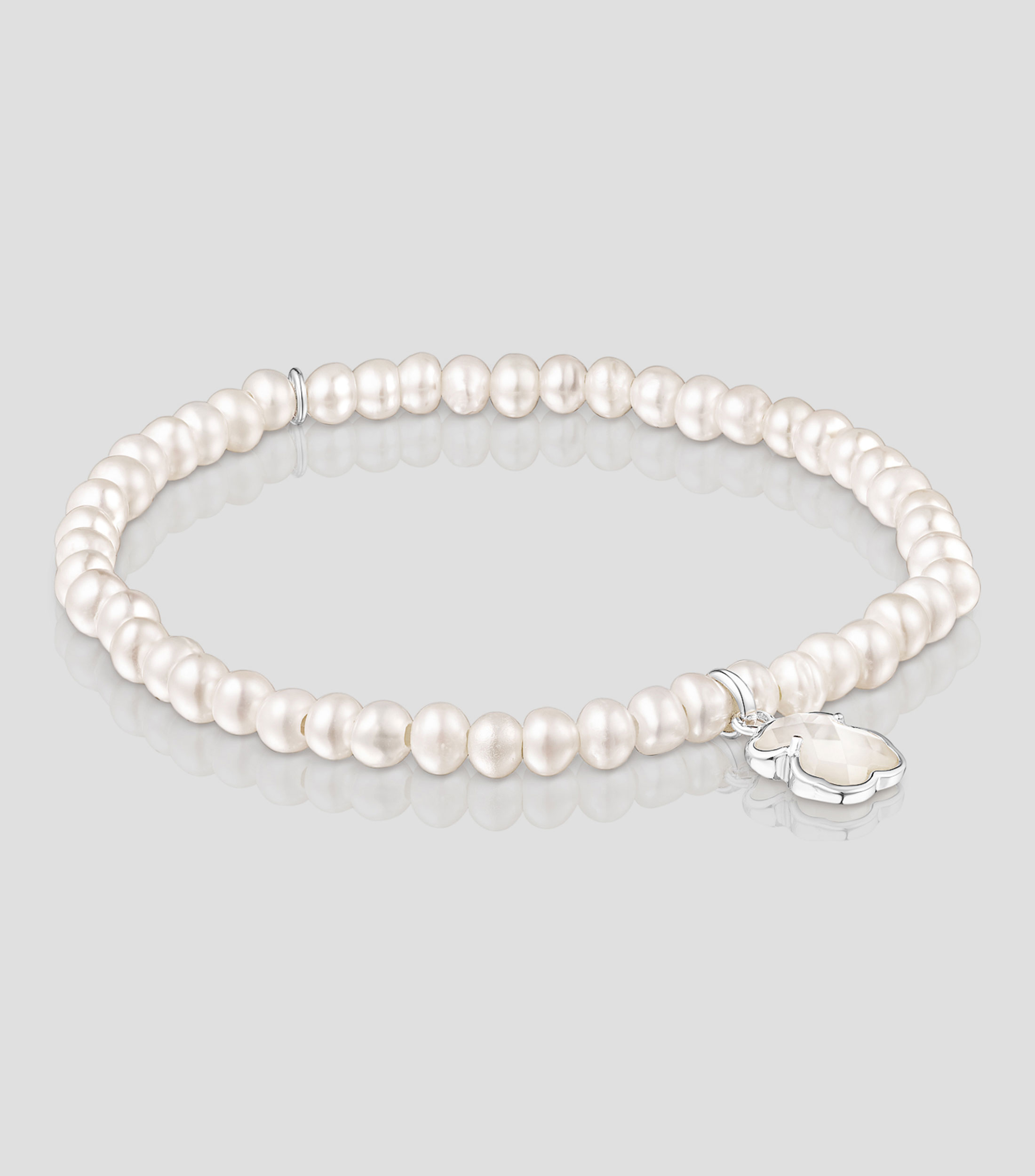 Pulsera elástica Blanca con perlas Icon Color Mujer