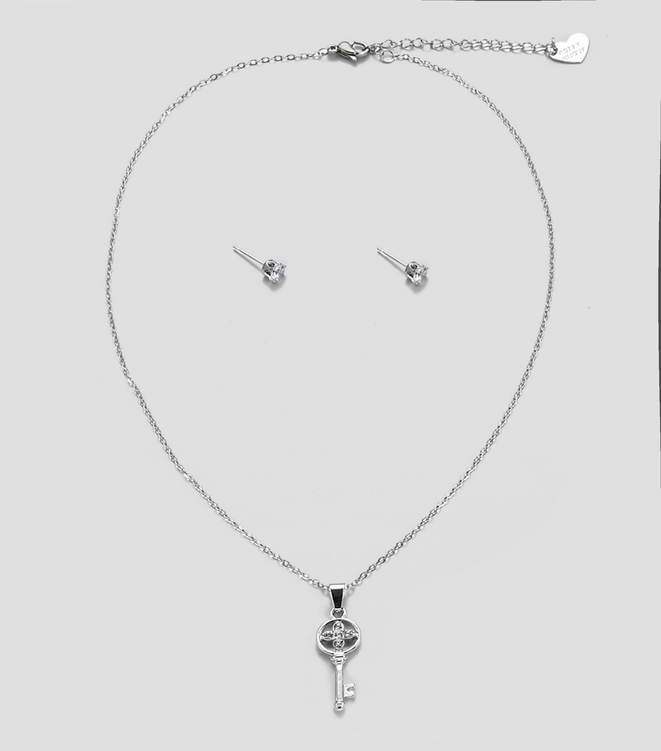 Set de collar y aretes en forma de llave Mujer