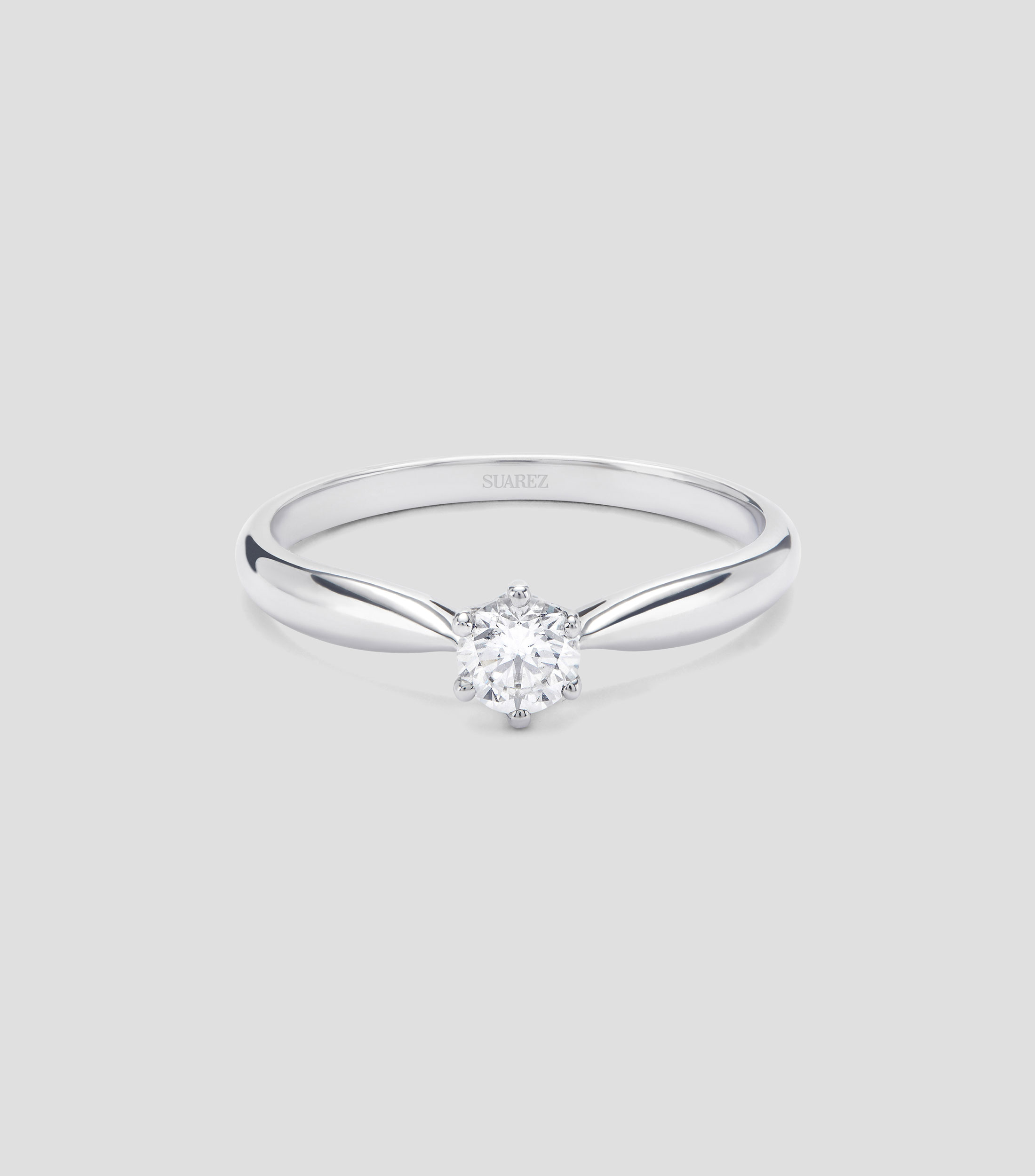 Anillo solitario en Oro blanco de 18 Kilates con diamante Mujer
