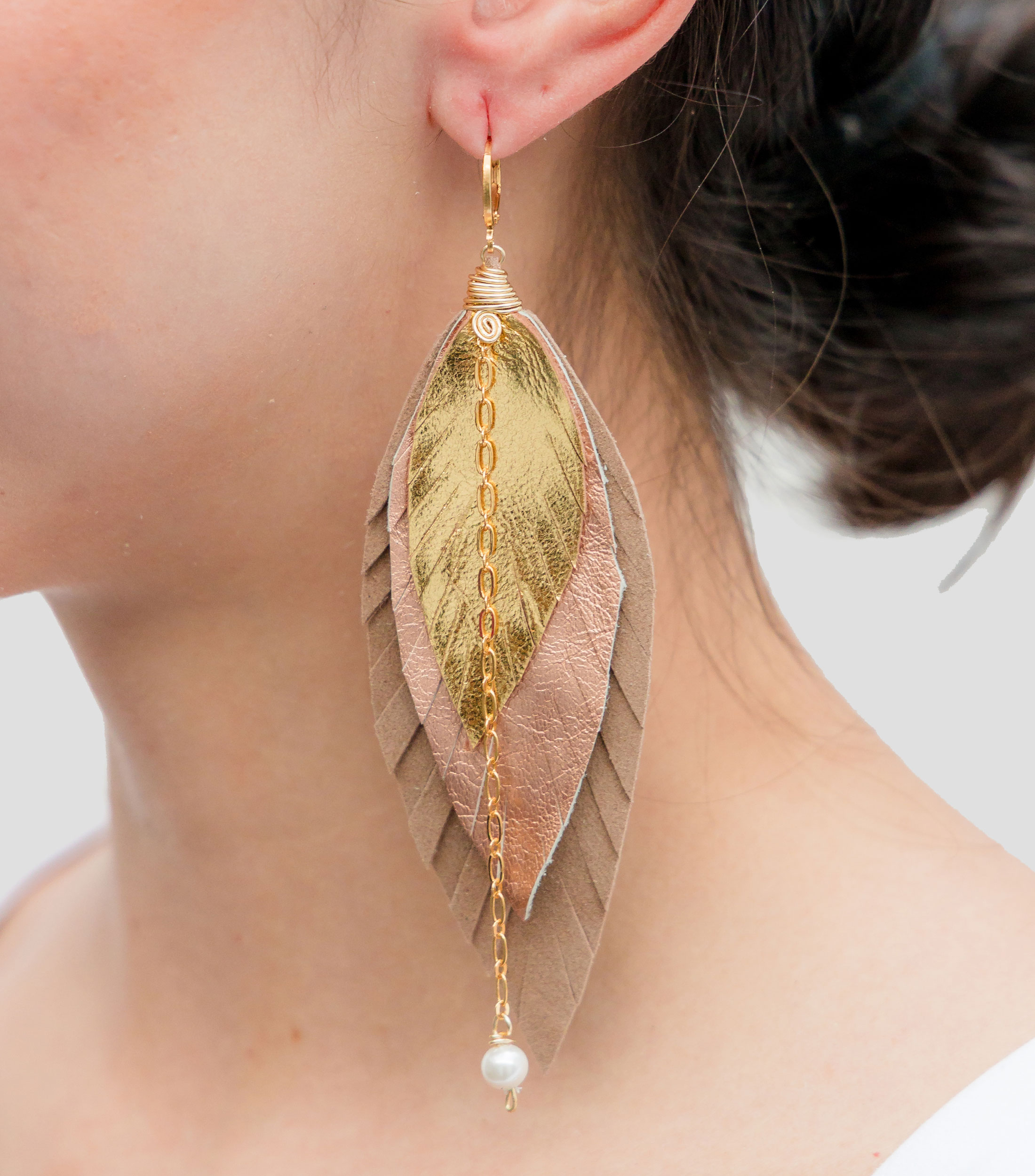 Aretes gavilán mediano Mujer