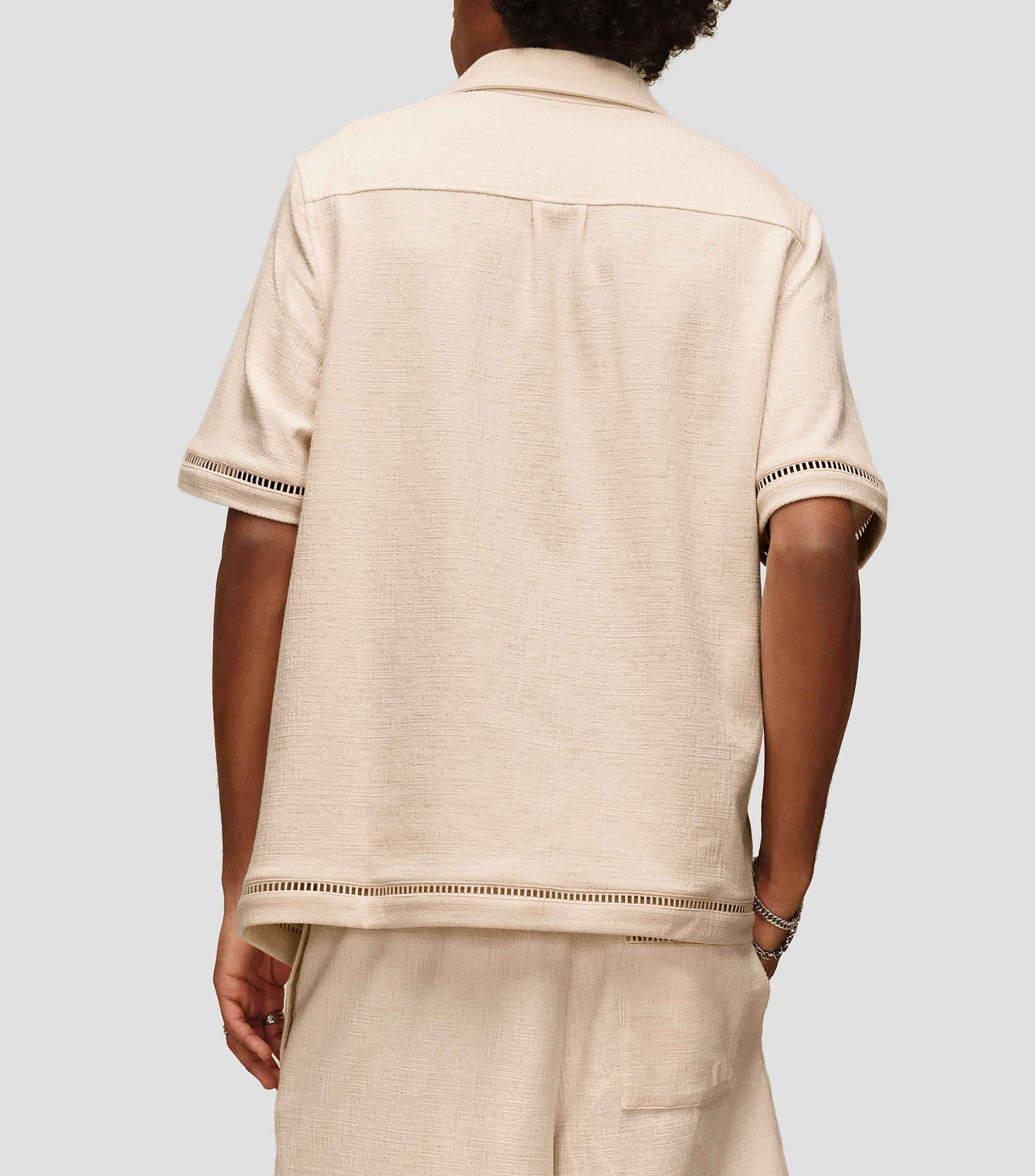 Playera de cuello camisero con manga corta lisa Hombre