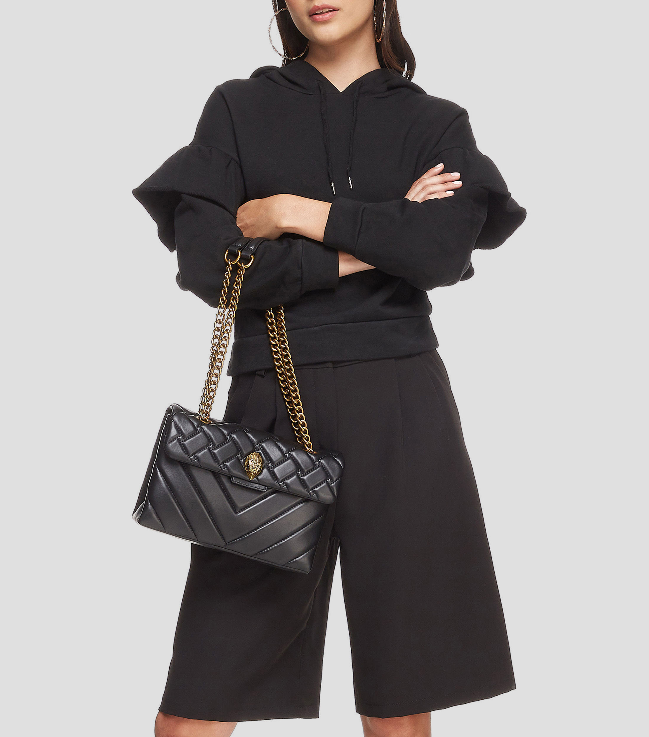 Bolsa crossbody negra en piel Kensington lisa Mujer