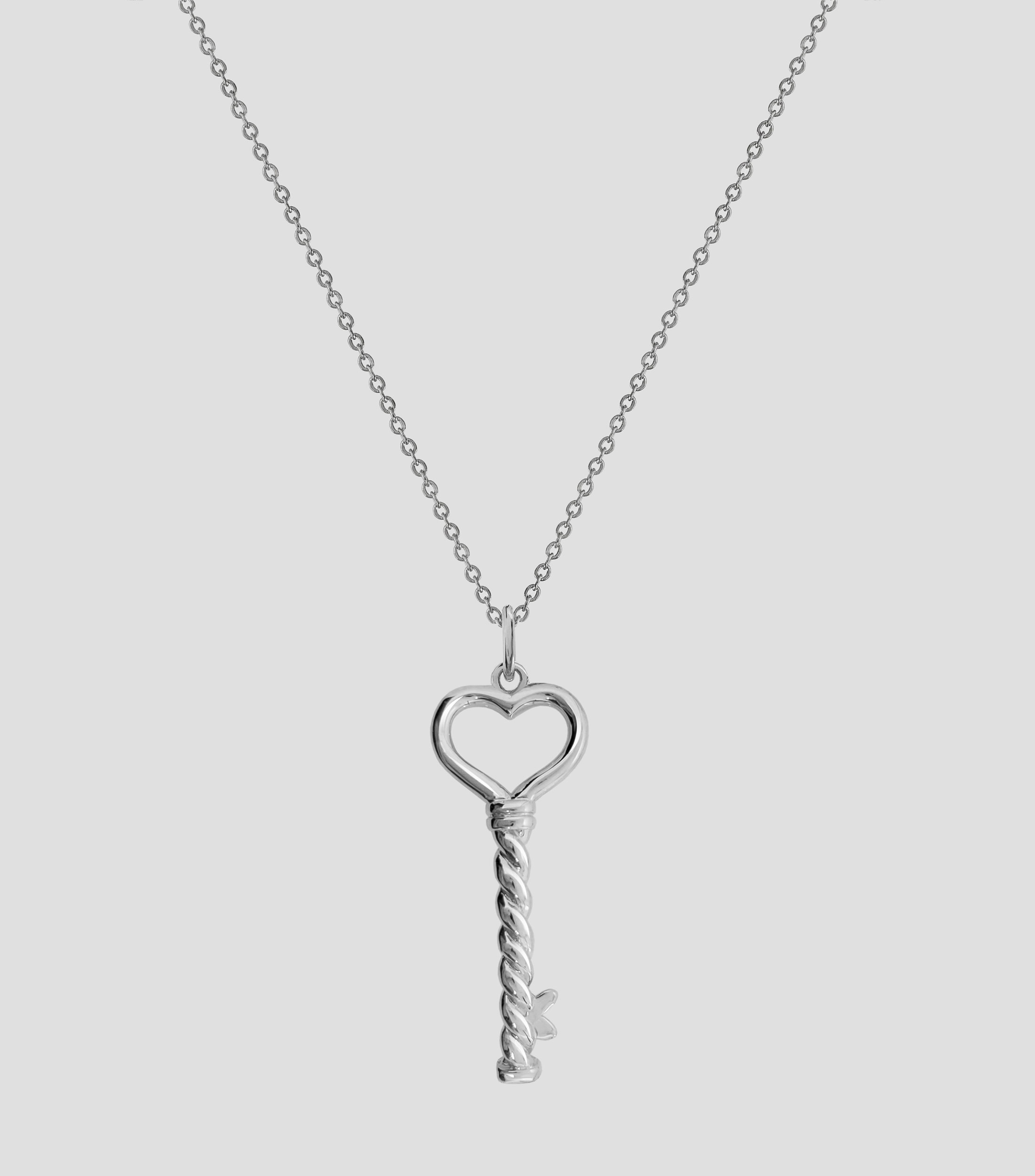 Dije Llave del corazon en plata .925 Mujer