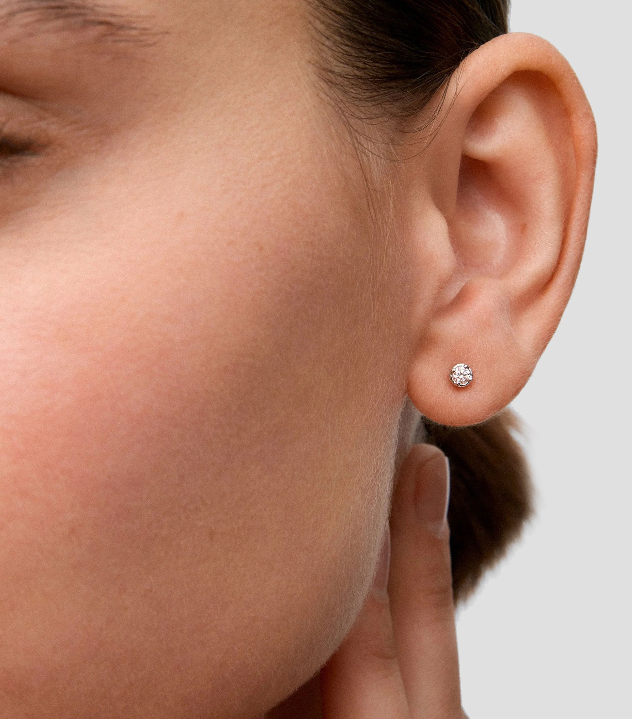 Aretes en oro de 18 Kts con diamantes Mujer