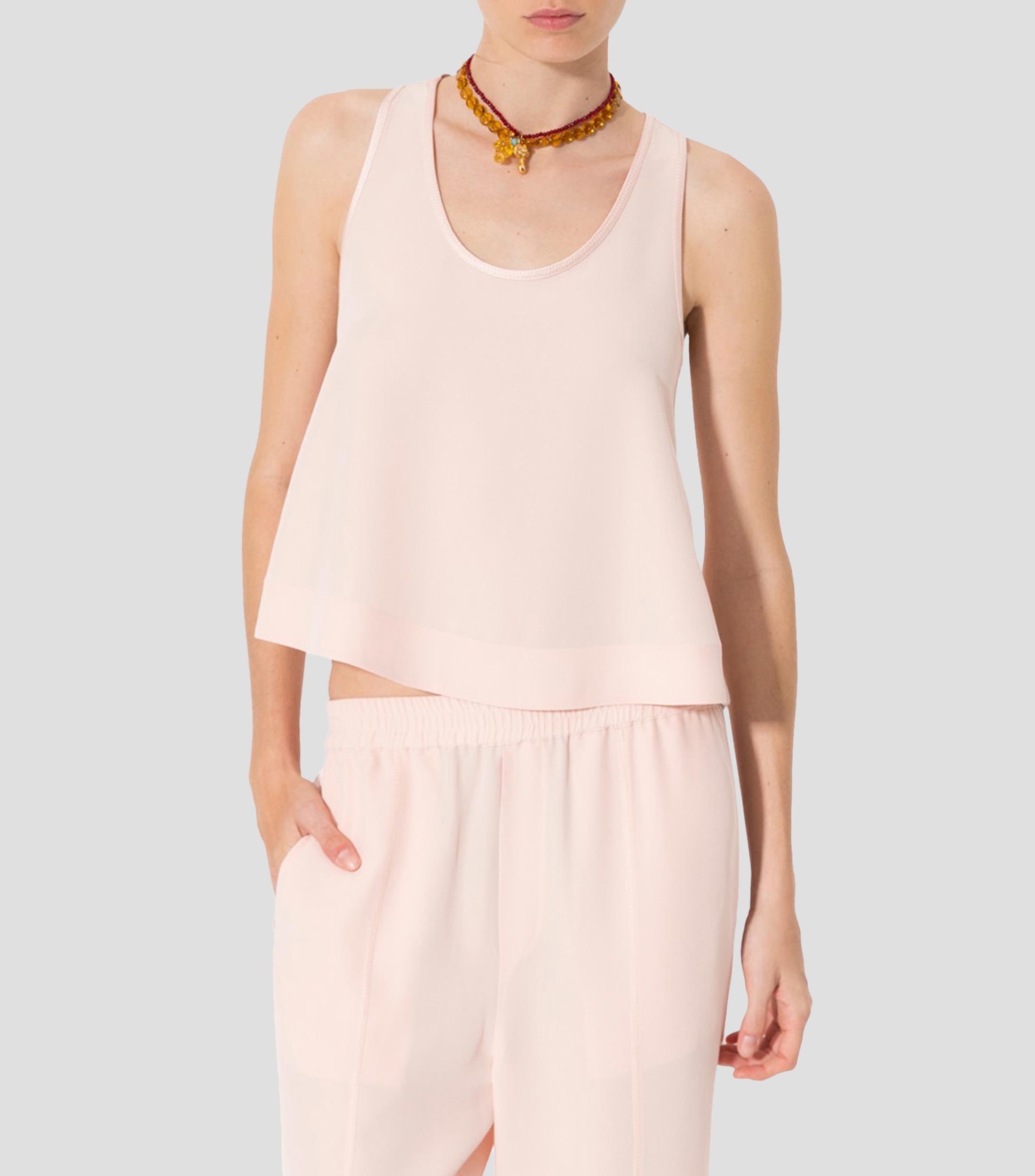 Blusa lisa sin mangas Mujer