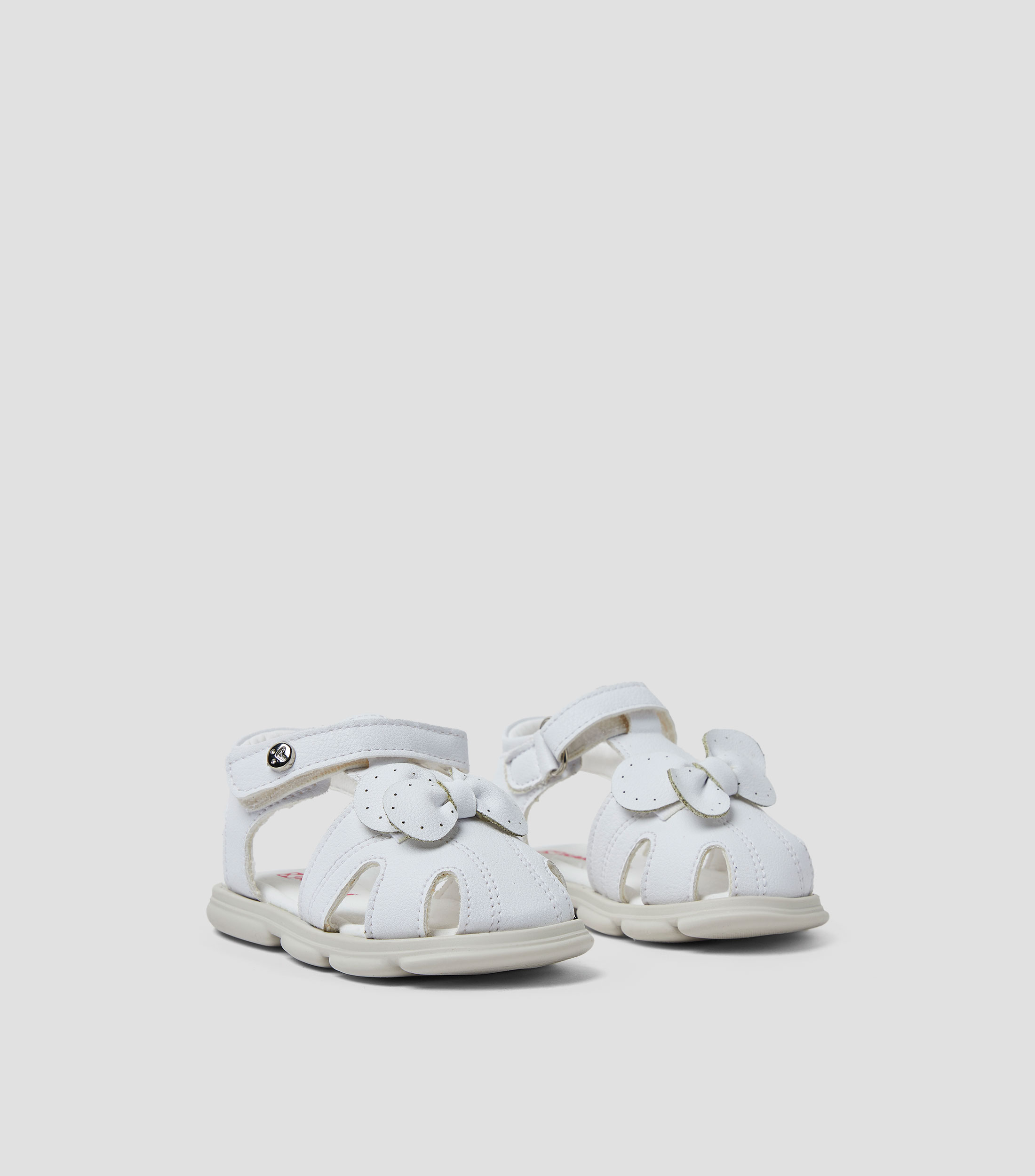 Sandalias planas con moño Niña