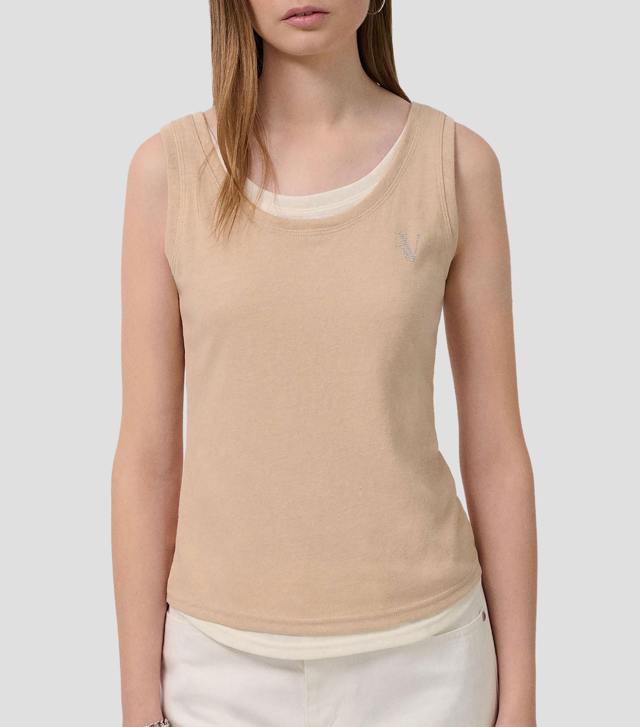 Playera cuello redondo sin mangas lisa Mujer