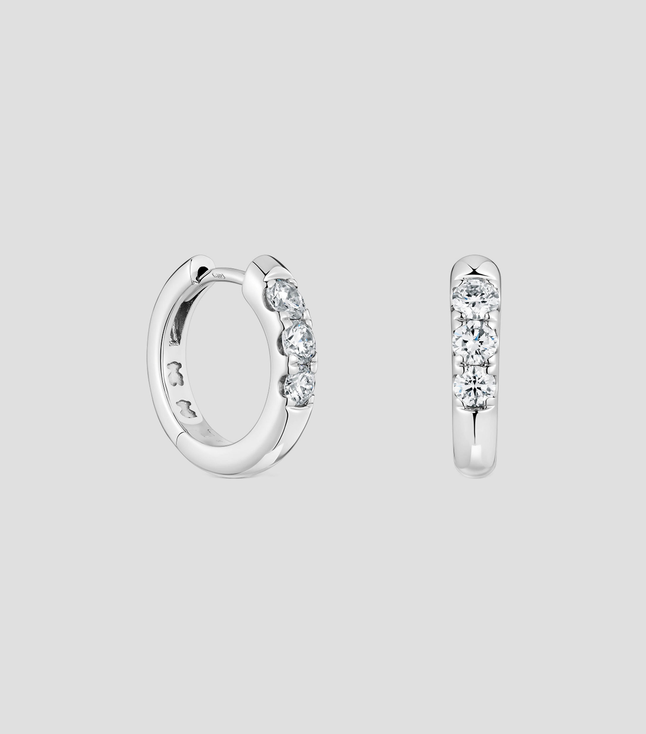 Aretes en Platino con Incrustación Mujer