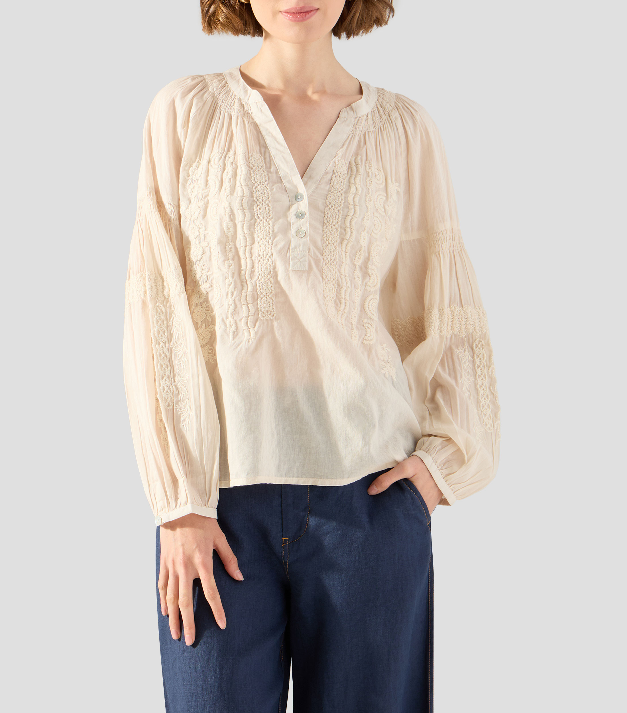 Blusa con bordado y manga larga Mujer