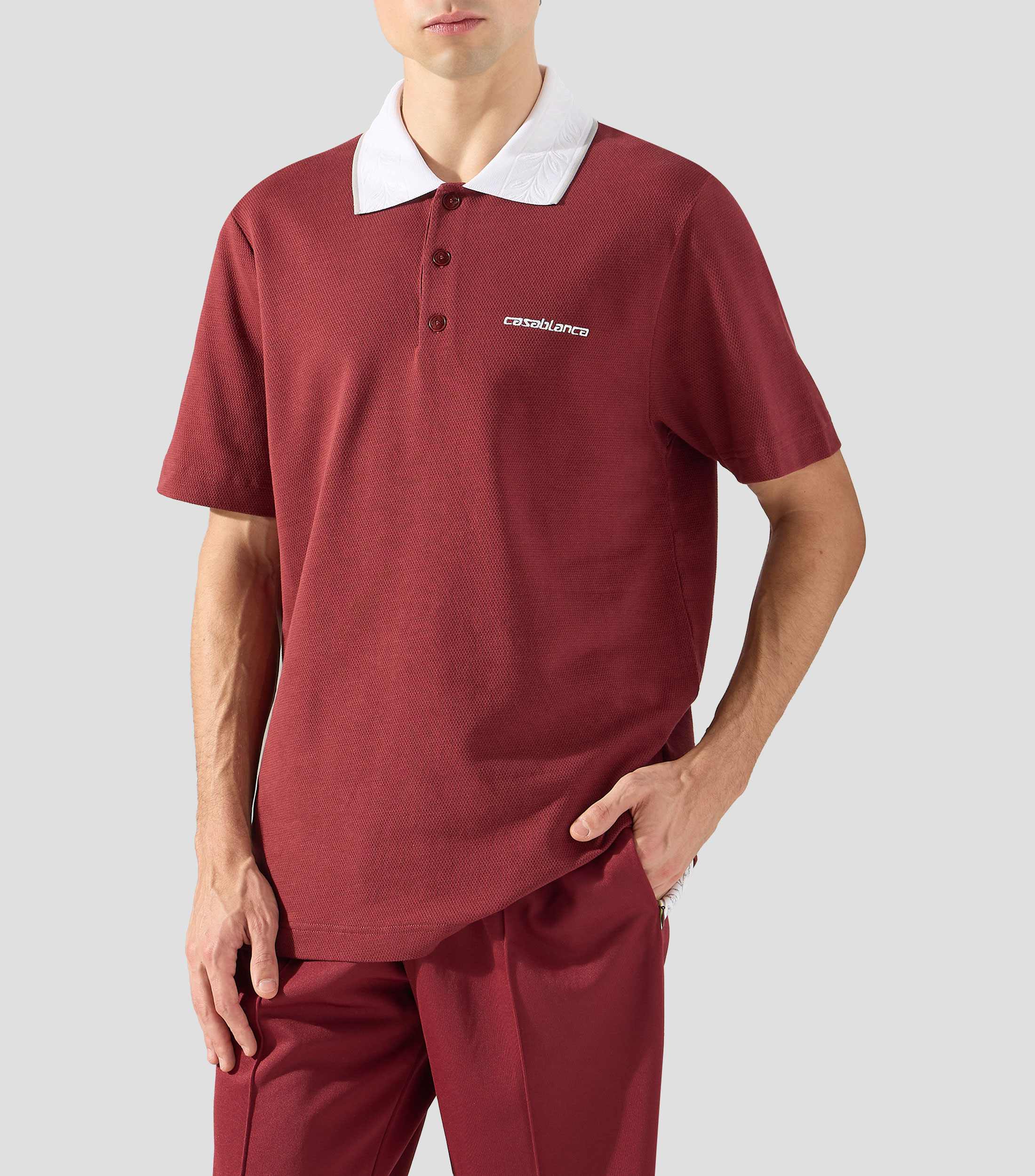 Playera tipo polo con manga corta lisa Hombre