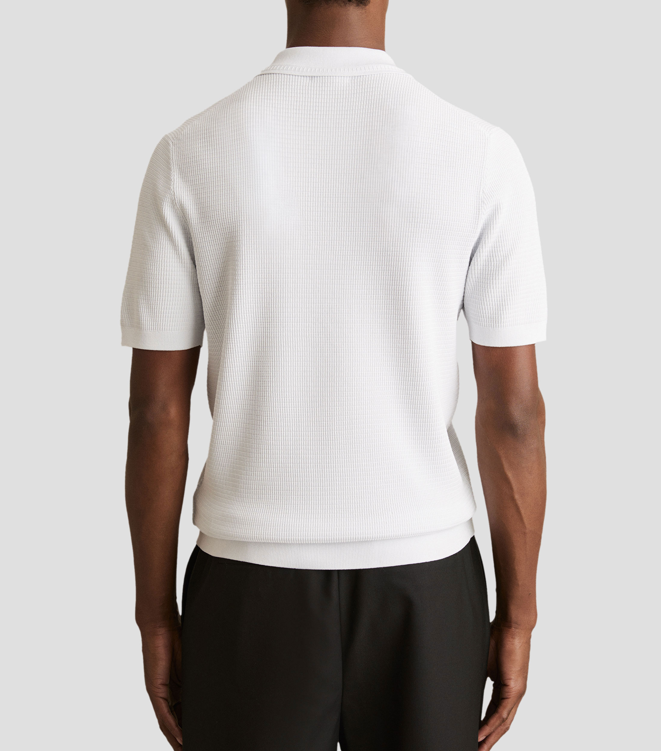 Playera tipo polo con manga corta lisa Hombre