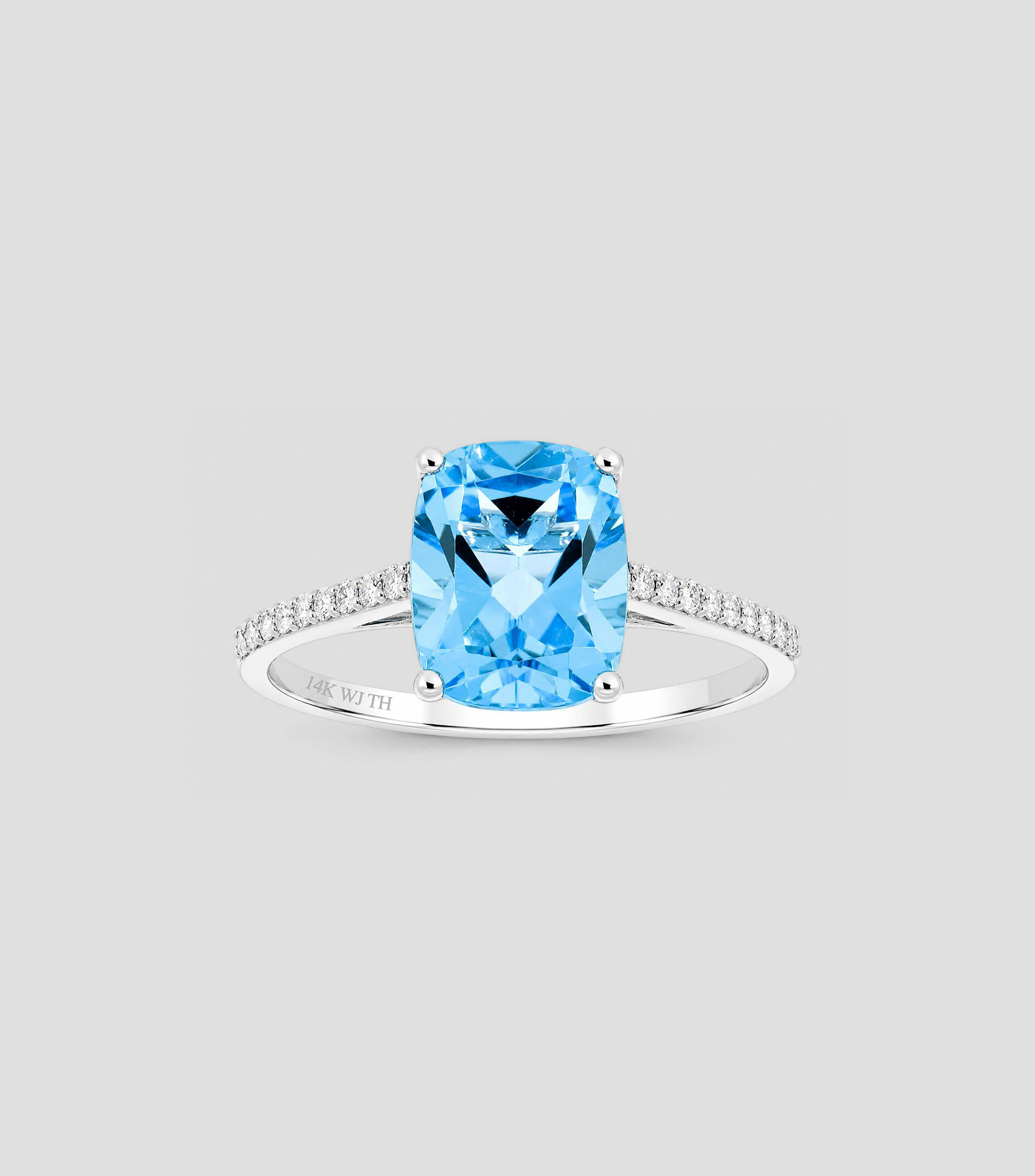 Anillo en Oro de 14 Kilates con topacio y diamantes Mujer