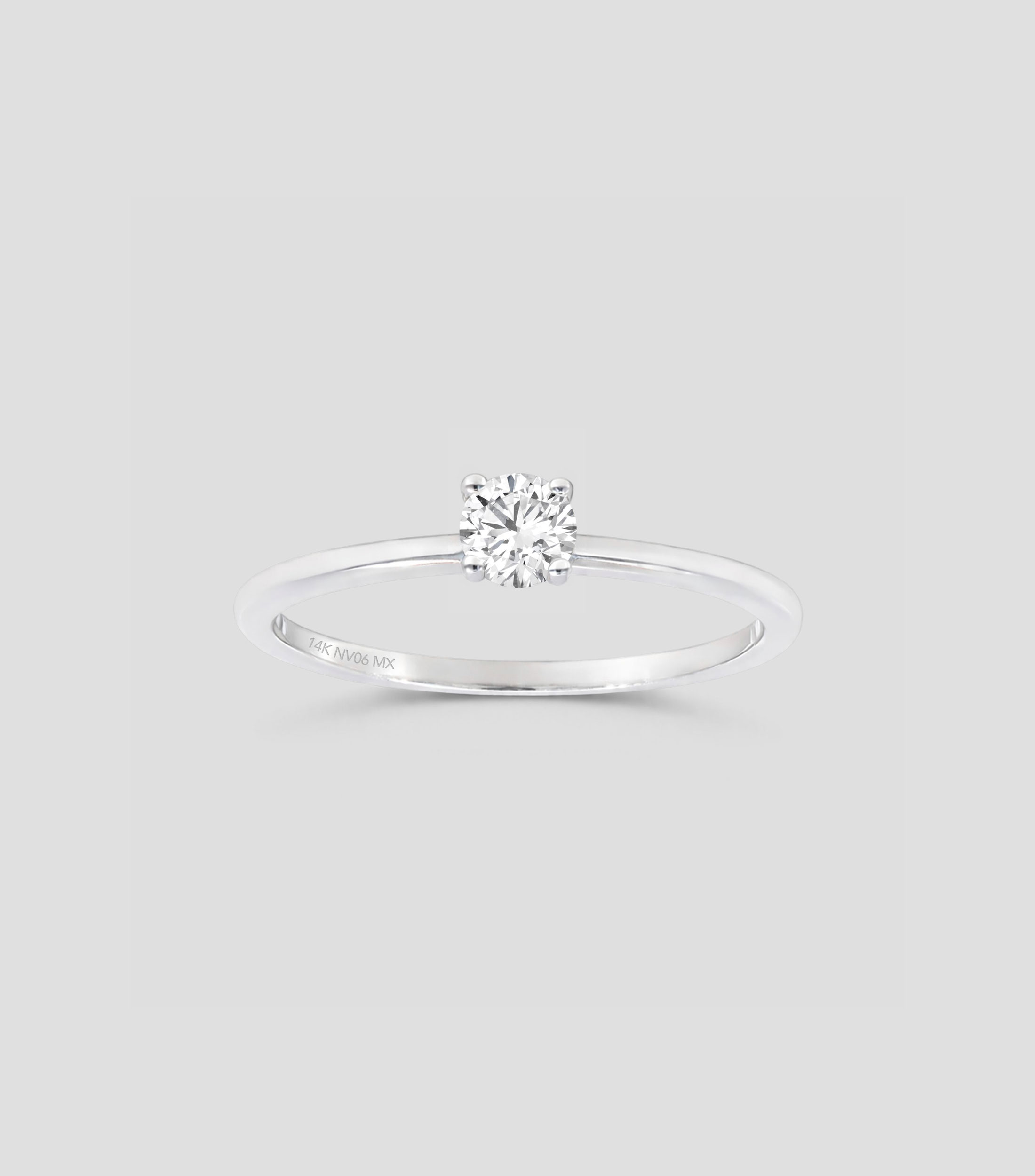 Anillo solitario en Oro blanco de 14 Kilates con diamante Mujer