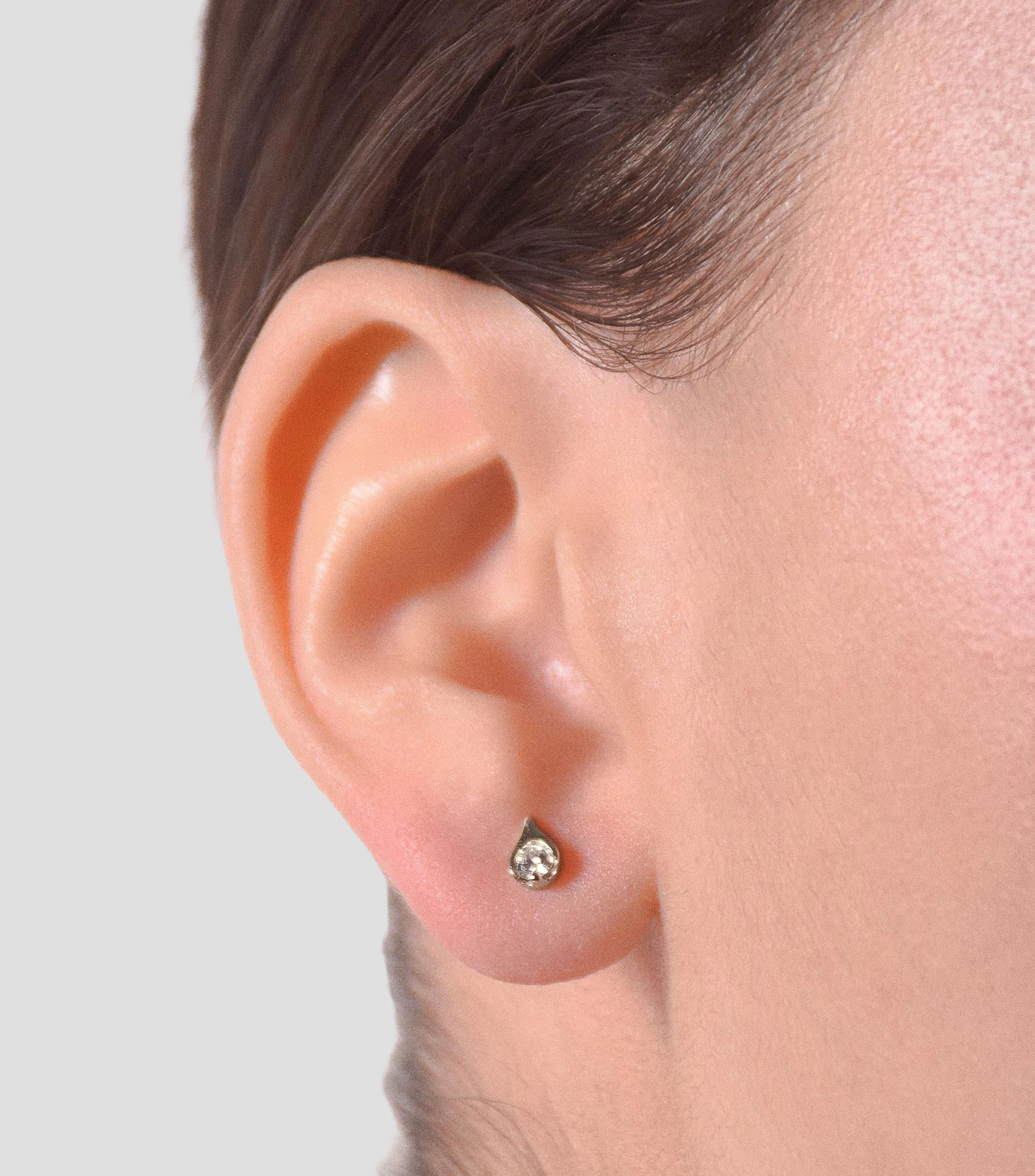 Broqueles en en Oro blanco de 18 Kilates con diamantes para mujer