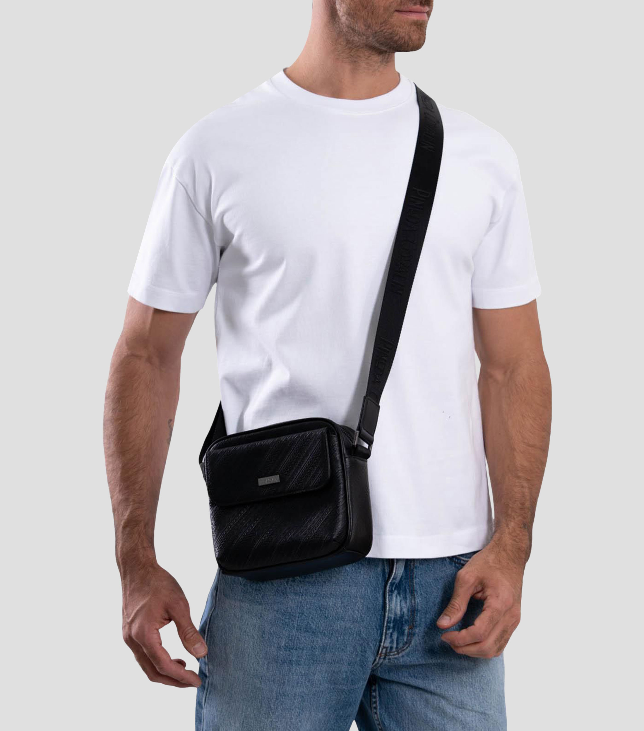 Bolso messenger en piel liso Hombre