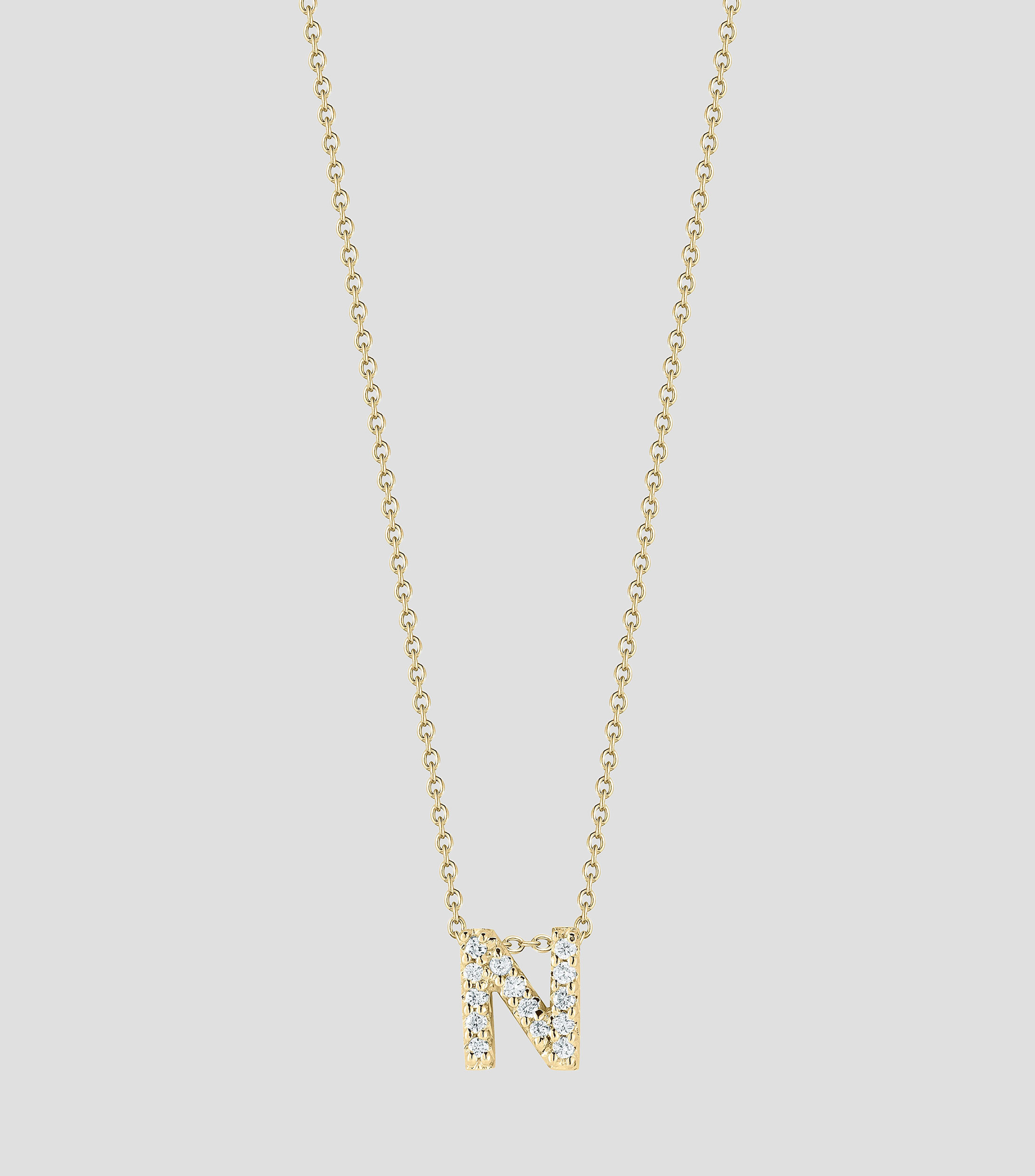 Collar en Oro amarillo de 18 Kilates letra N con diamantes Mujer
