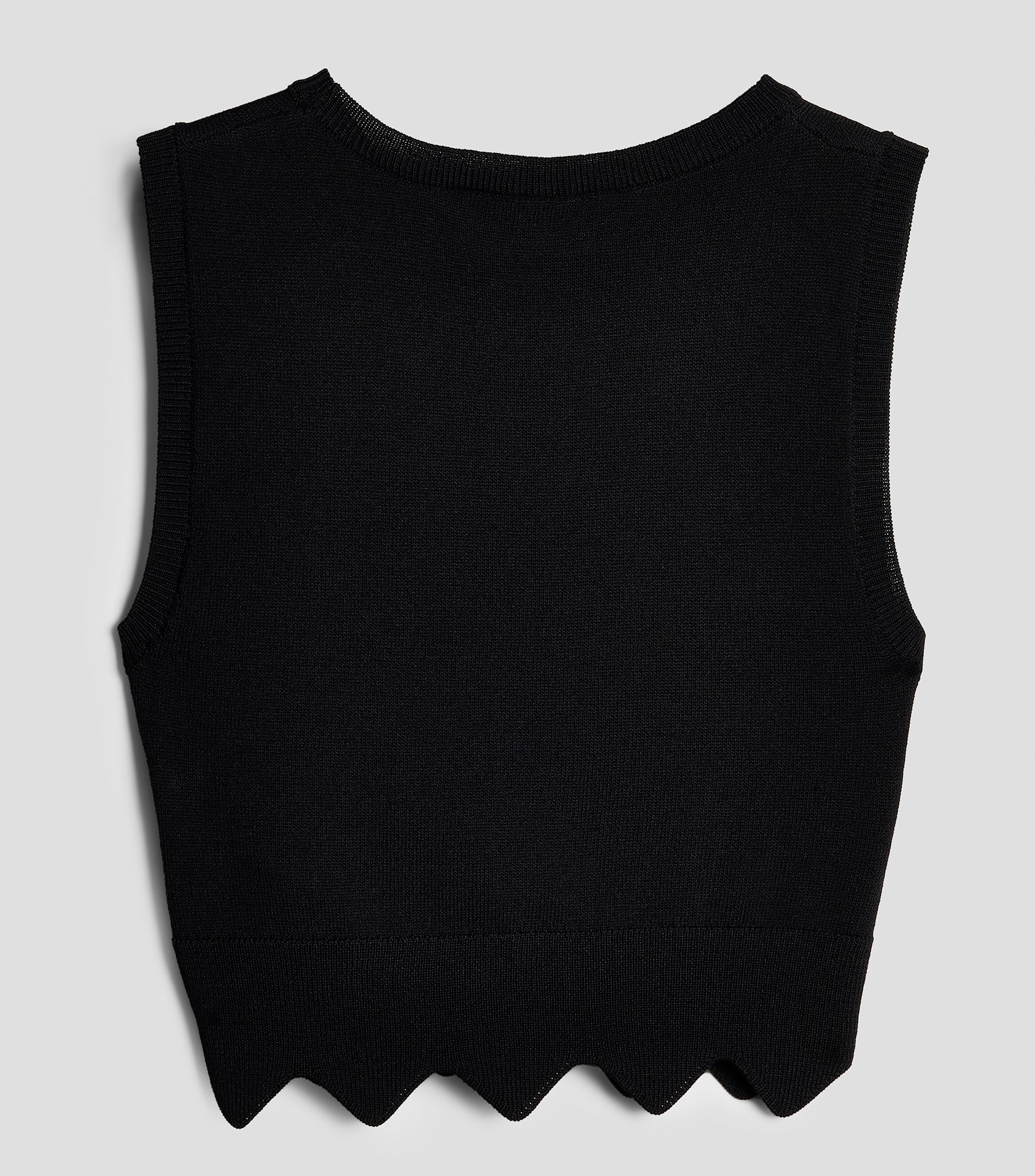 Blusa lisa sin mangas Niña