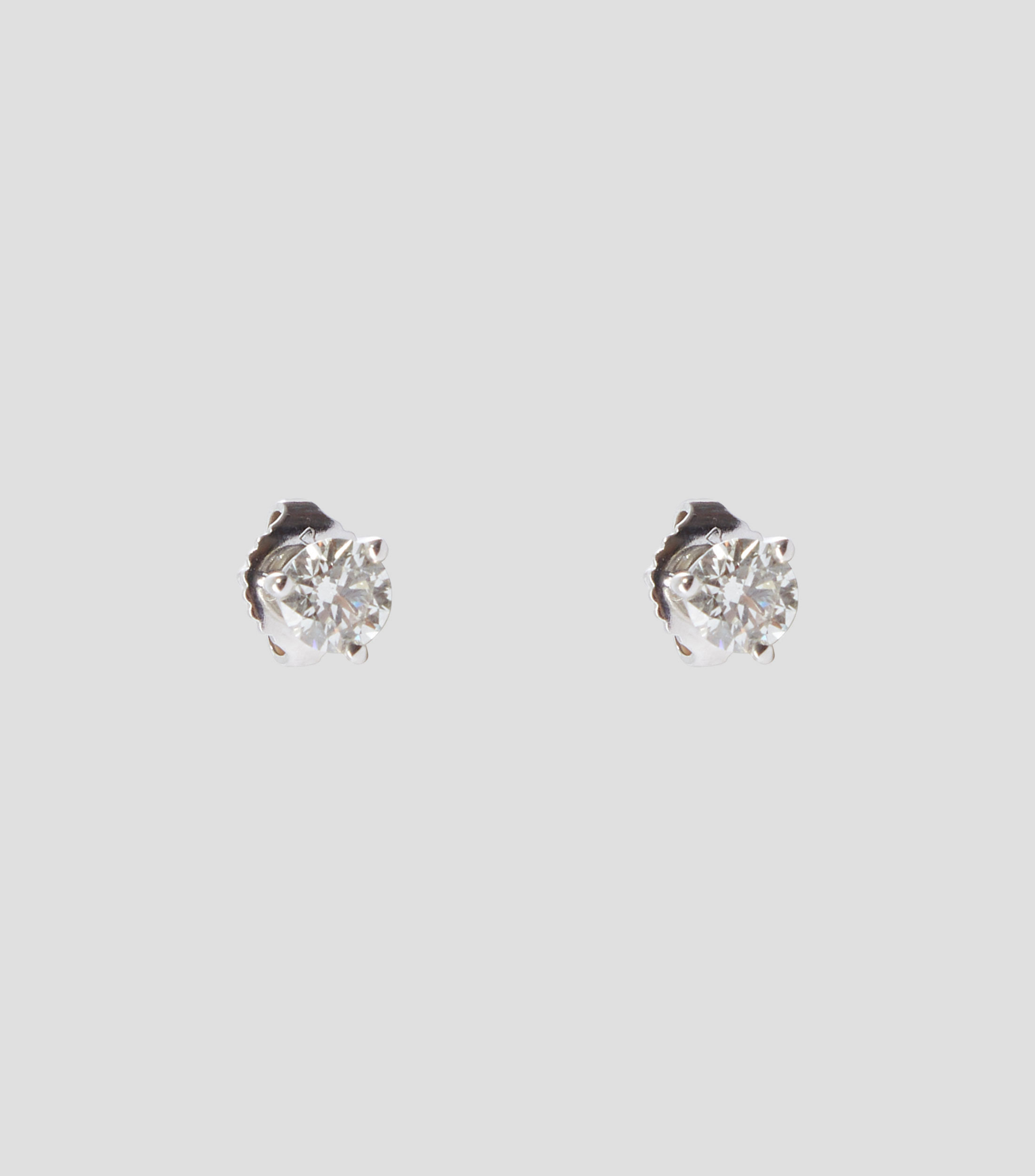 Aretes en oro blanco 14 Kts con brillante Mujer