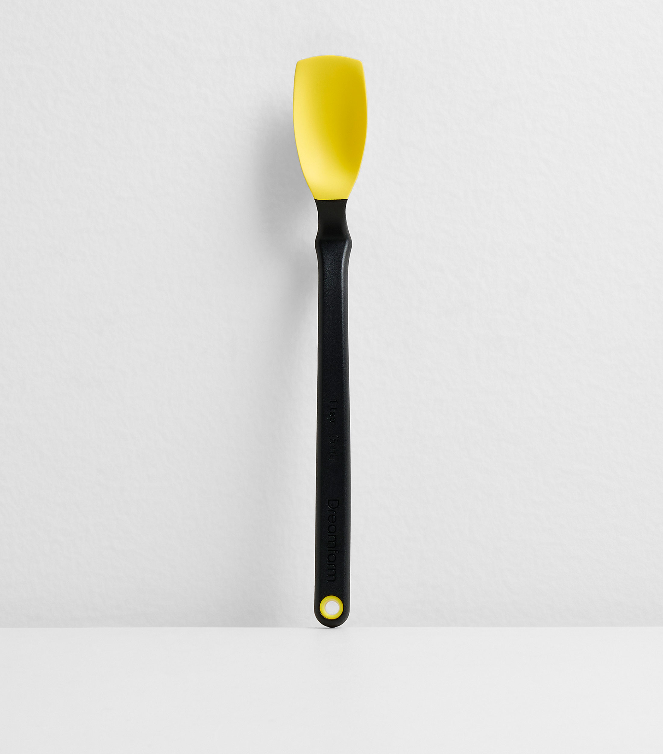 Cuchara de cocina amarilla