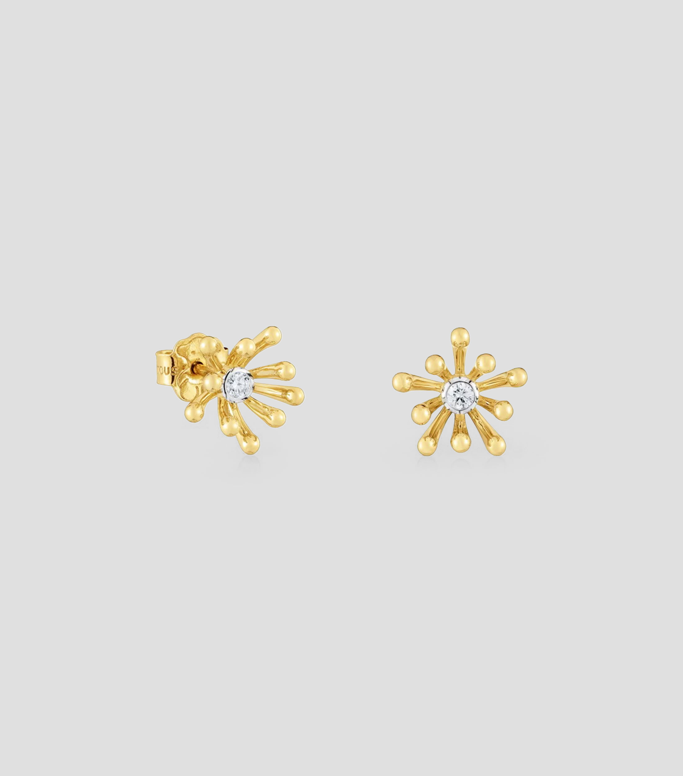 Aretes en oro flor Mujer