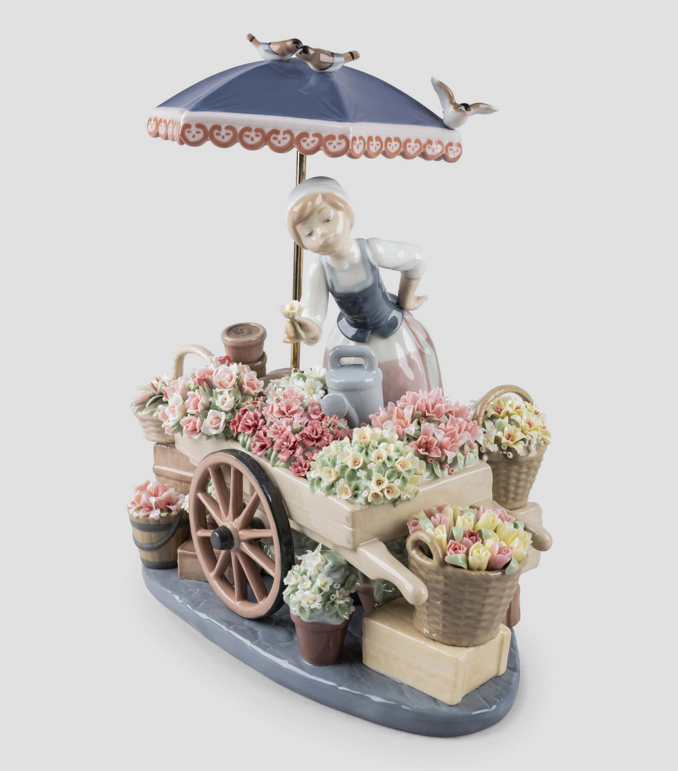 Figura Decorativa "Mujer, Puesto de Flores" en porcelana