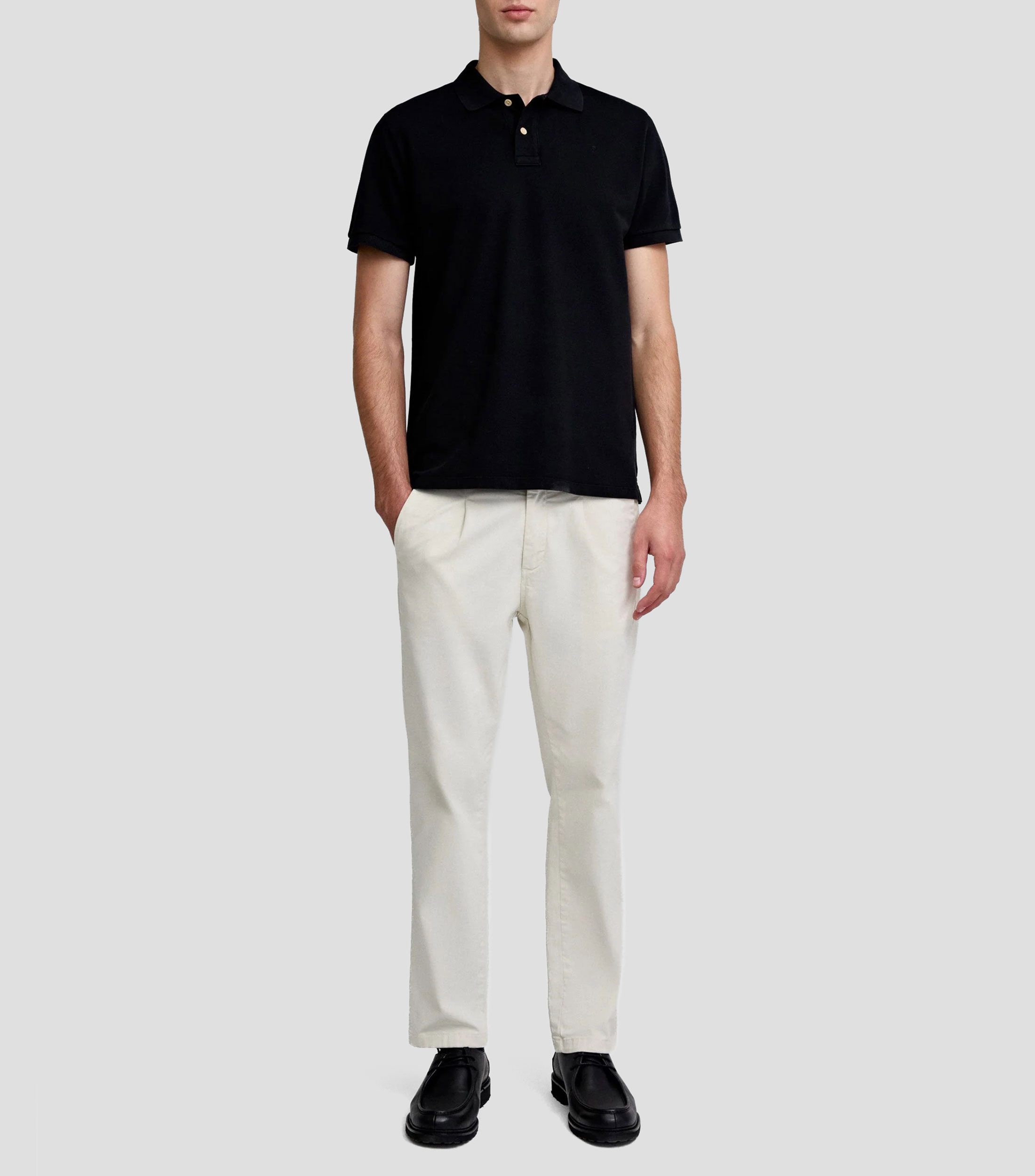 Playera tipo polo con manga corta lisa Hombre