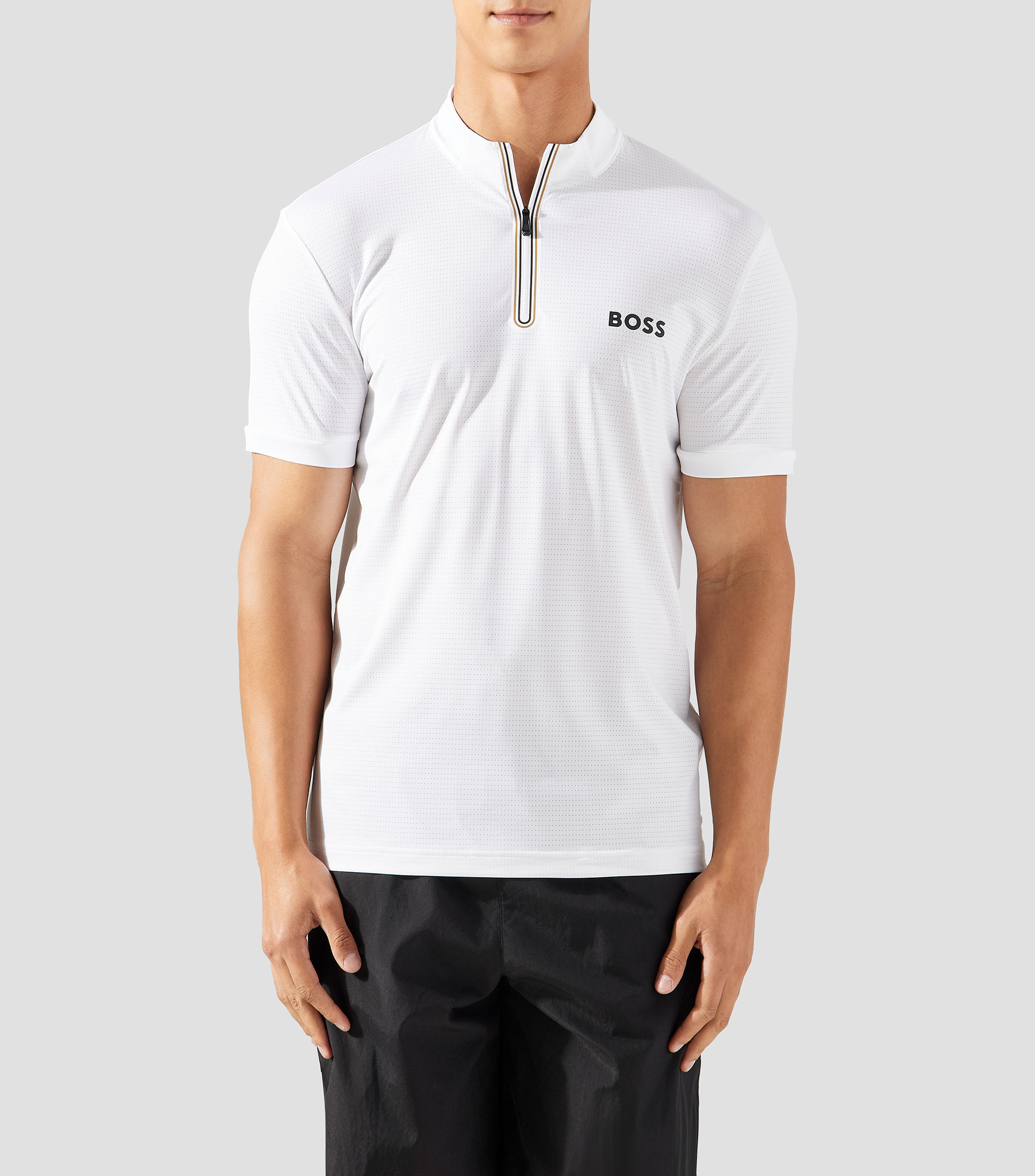 Playera con cremallera en el cuello en punto de malla elástica Hombre